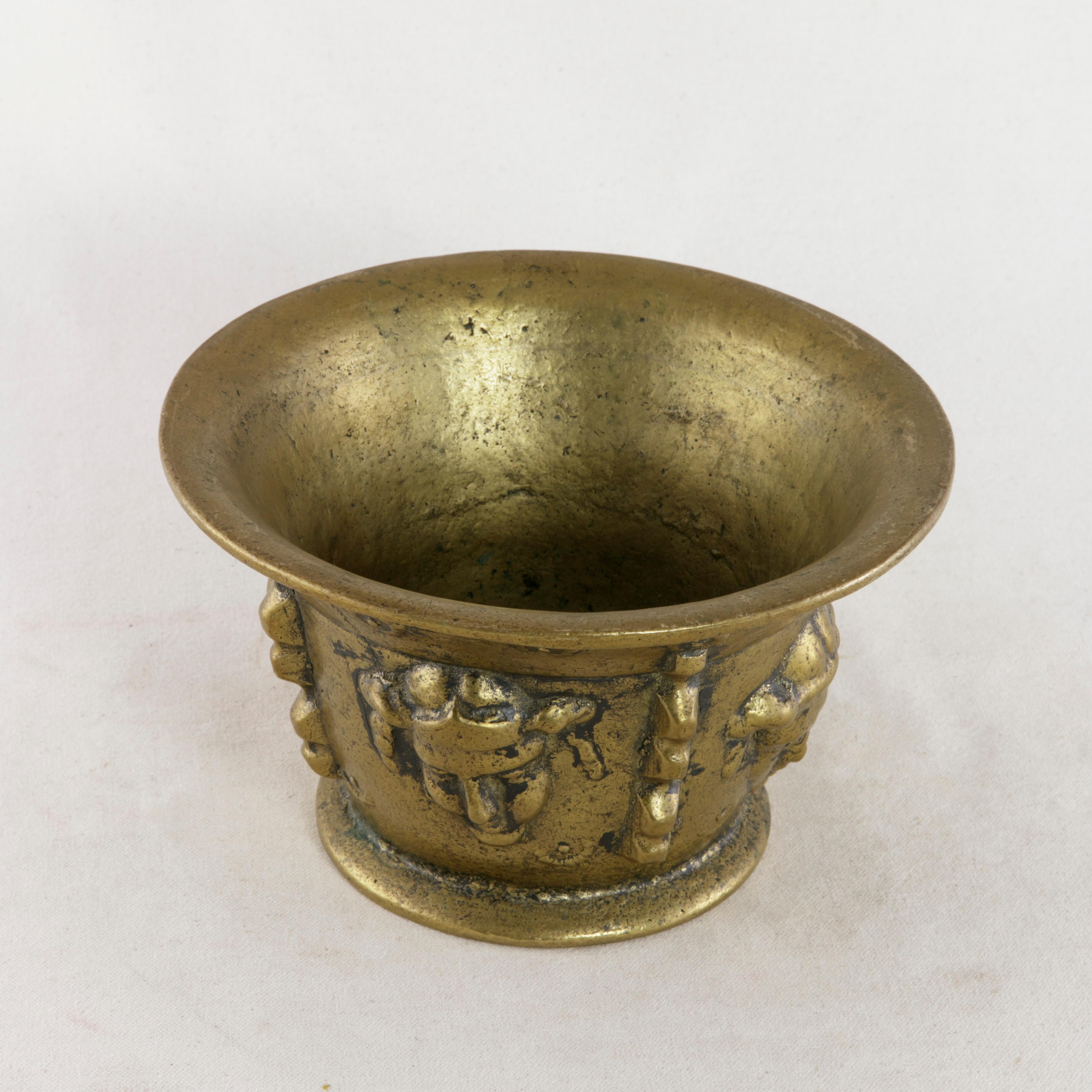Early 20th Century French Bronze Mortar and Pestle with Masks Motif 6