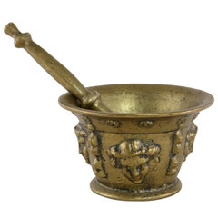 Early 20th Century French Bronze Mortar and Pestle with Masks Motif