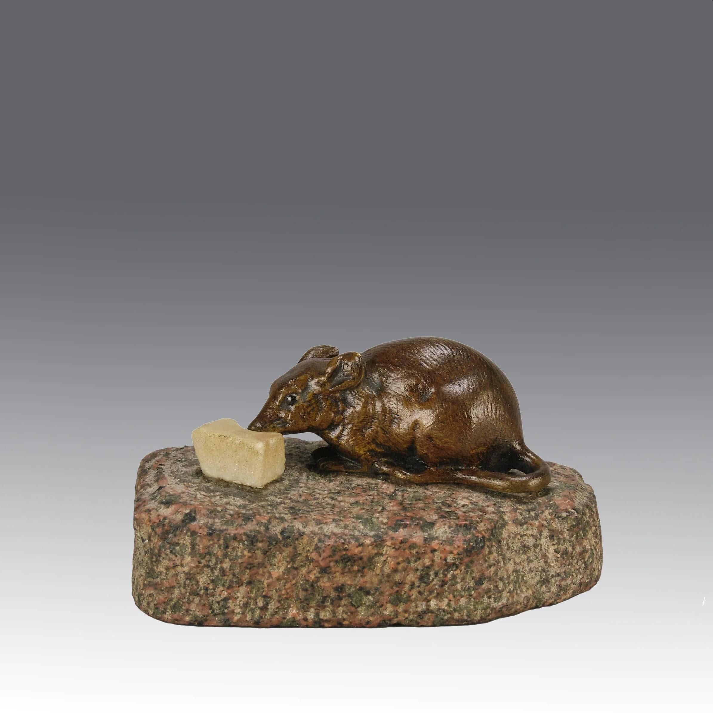 Charming late 19th century French animalier bronze study of a mouse nibbling some cheese depicted in cream marble. The bronze study exhibiting excellent hand chased surface detail and good colour, raised on a rough hewn granite base

ADDITIONAL