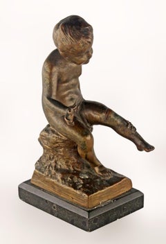 Early 20th Century French Bronze Sculpture with Marble Base of a Sitting Boy