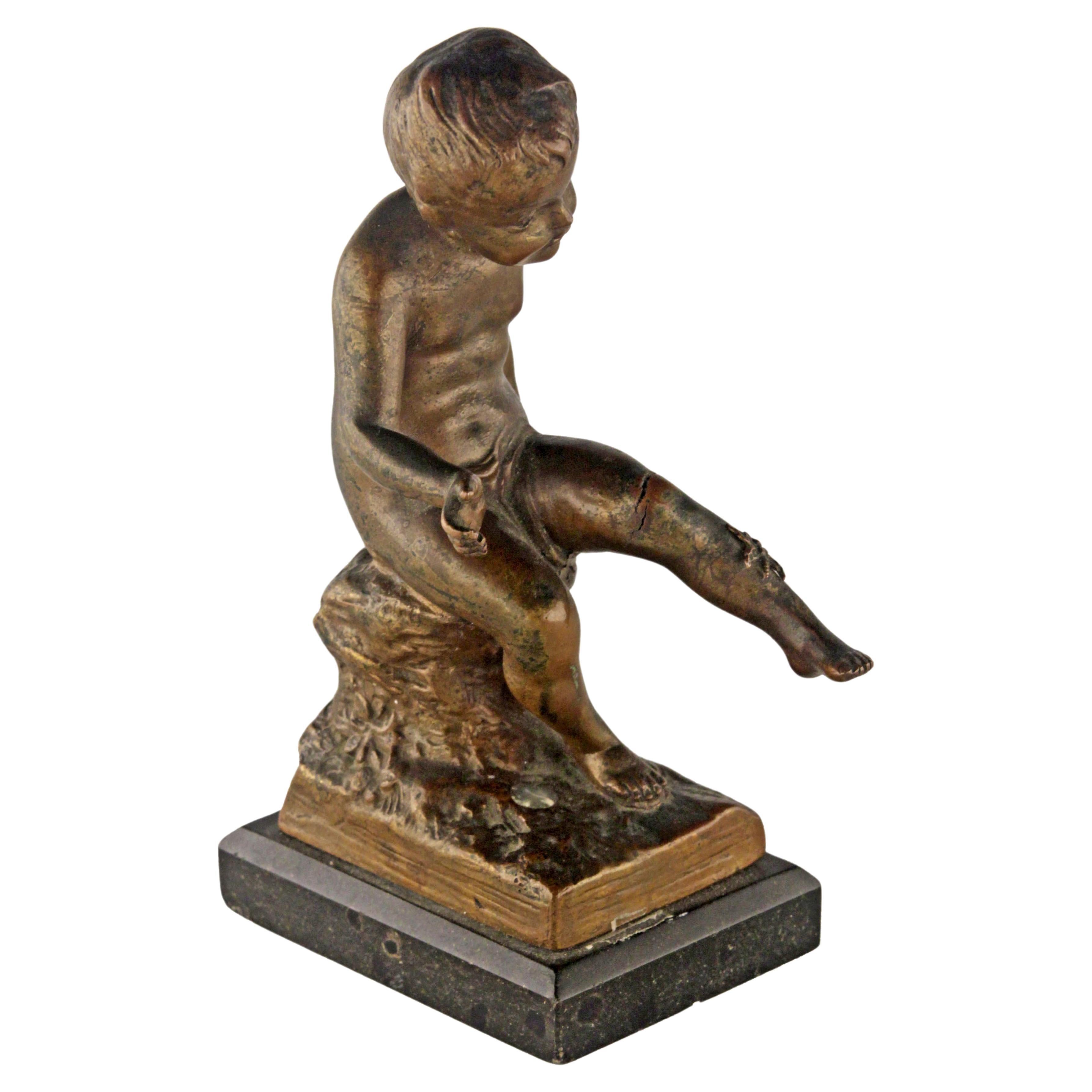 Early 20th Century French Bronze Sculpture with Marble Base of a Sitting Boy