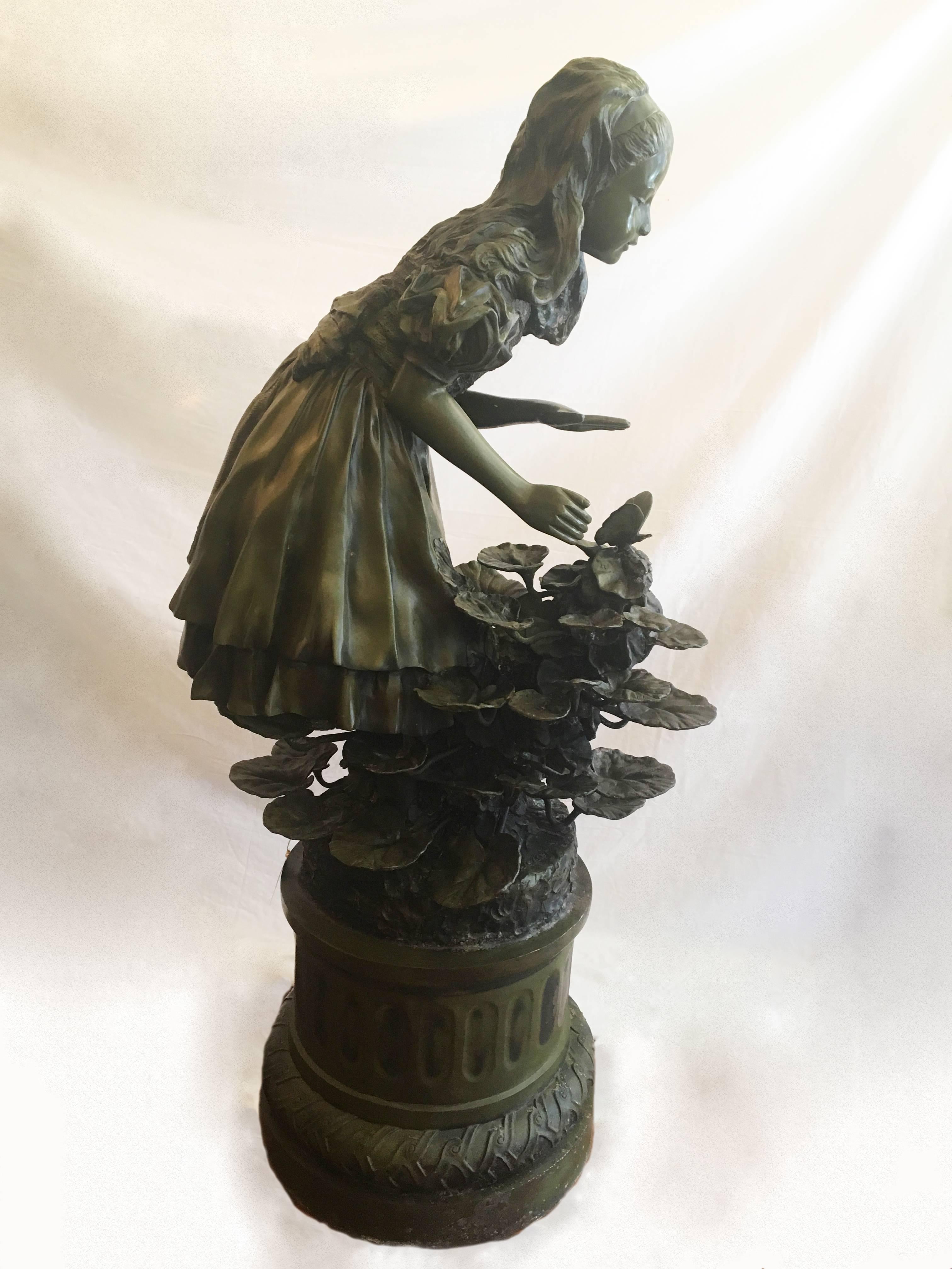 This 1900s French bronze over Iron lifesize statue/fountain of 