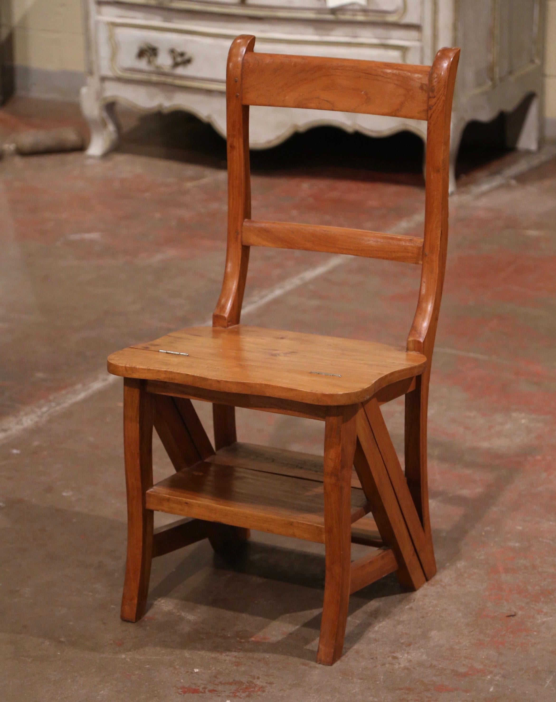 Decorate a library or study with this artisan-made folding step ladder chair. Crafted in Southern France circa 1920, the metamorphic chair features two carved ladders in the back; the double-function piece is hinged so that it can convert into a