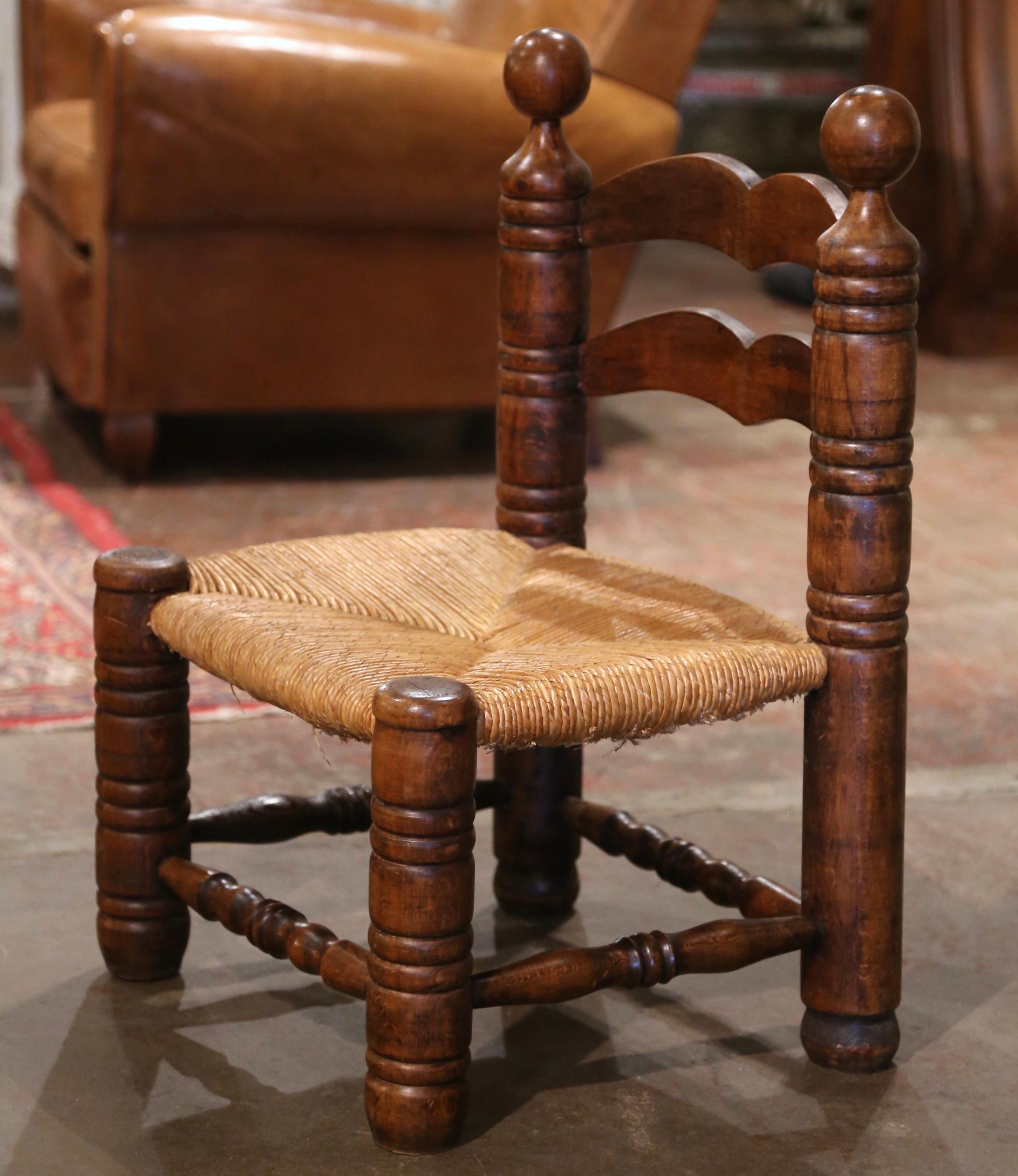 Country Early 20th Century French Carved Oak and Rush Seat Low Fireplace Armchair  For Sale