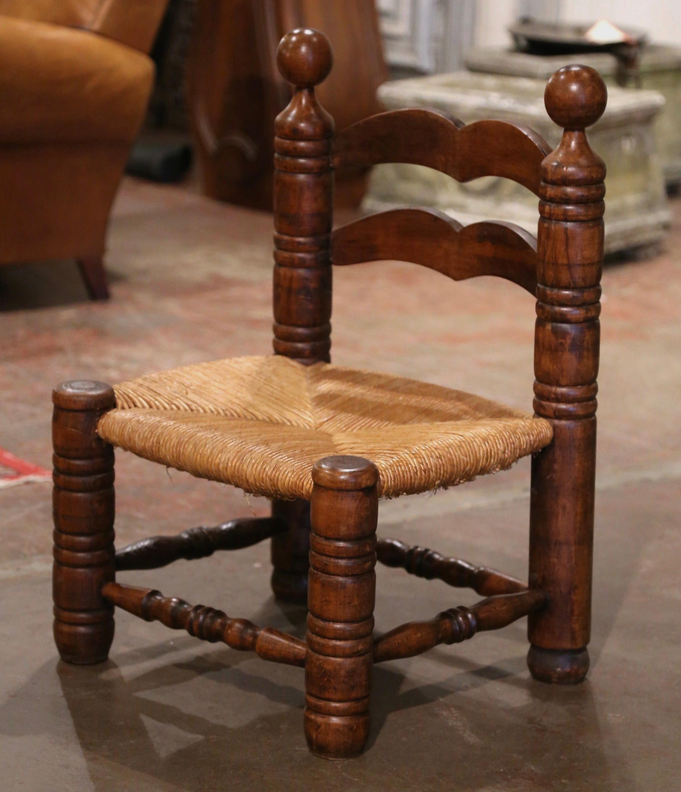 Early 20th Century French Carved Oak and Rush Seat Low Fireplace Chair  In Excellent Condition For Sale In Dallas, TX