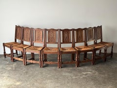 Early 20th Century French Carved Oak Rush Seat Dining Chairs, Set of 8