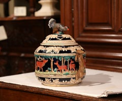 Early 20th Century French Carved Painted Ceramic Soup Tureen with Hunt Motifs