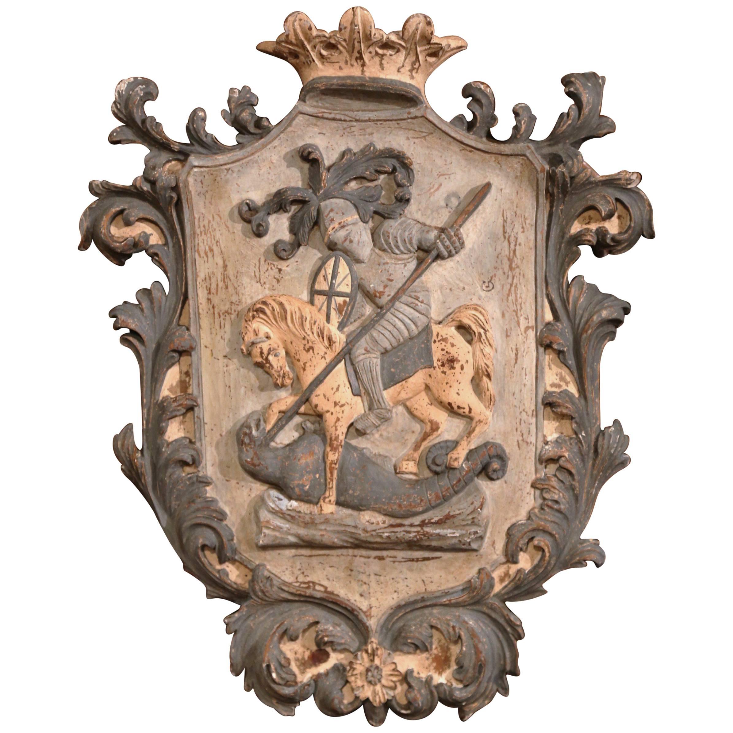 Early 20th Century French Carved Painted Wall Hanging Crest with Armored Soldier