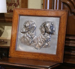 Bassotti da caccia in peltro intagliato all'inizio del XX secolo in cornice di Wood