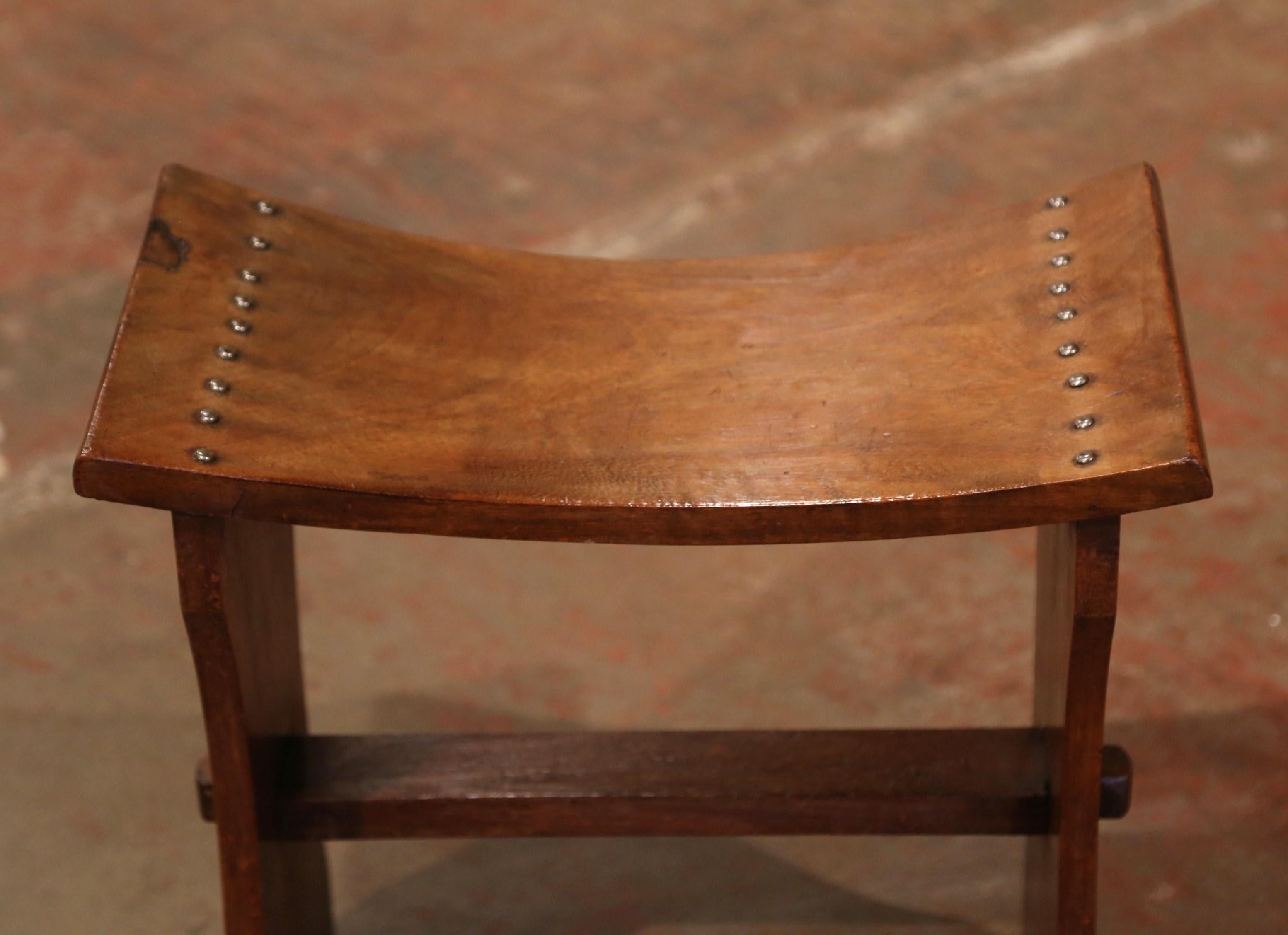 Patinated Early 20th Century French Carved Walnut Concave Stool