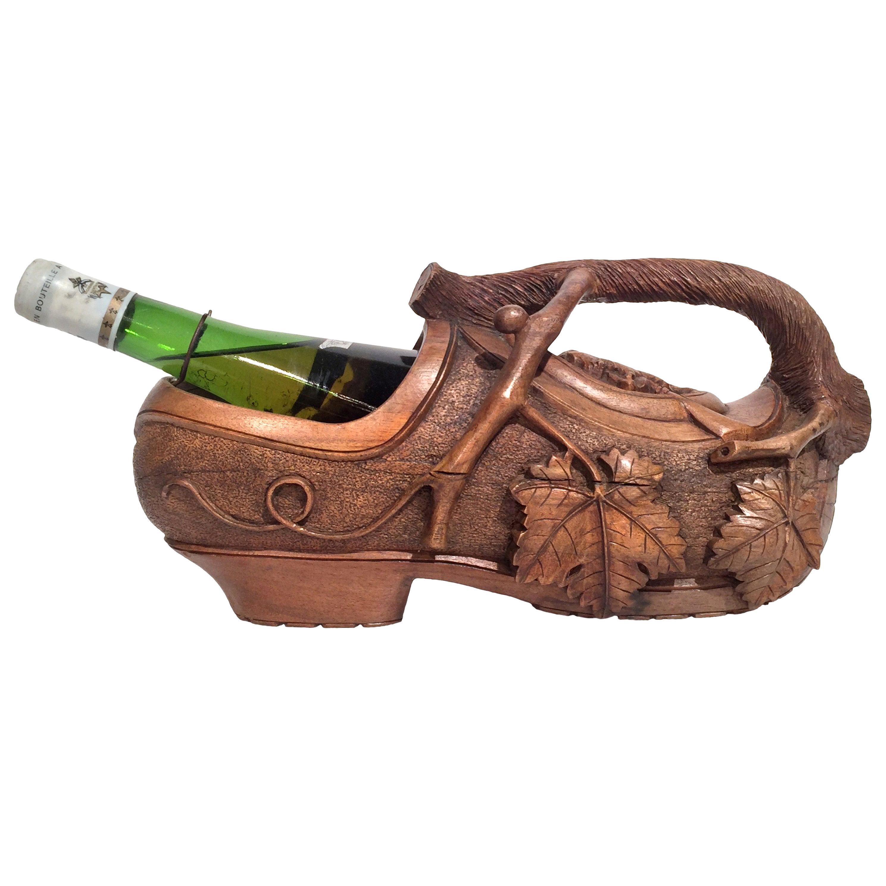 Early 20th Century French Carved Walnut Wine Bottle Holder Clog with Vine Decor For Sale