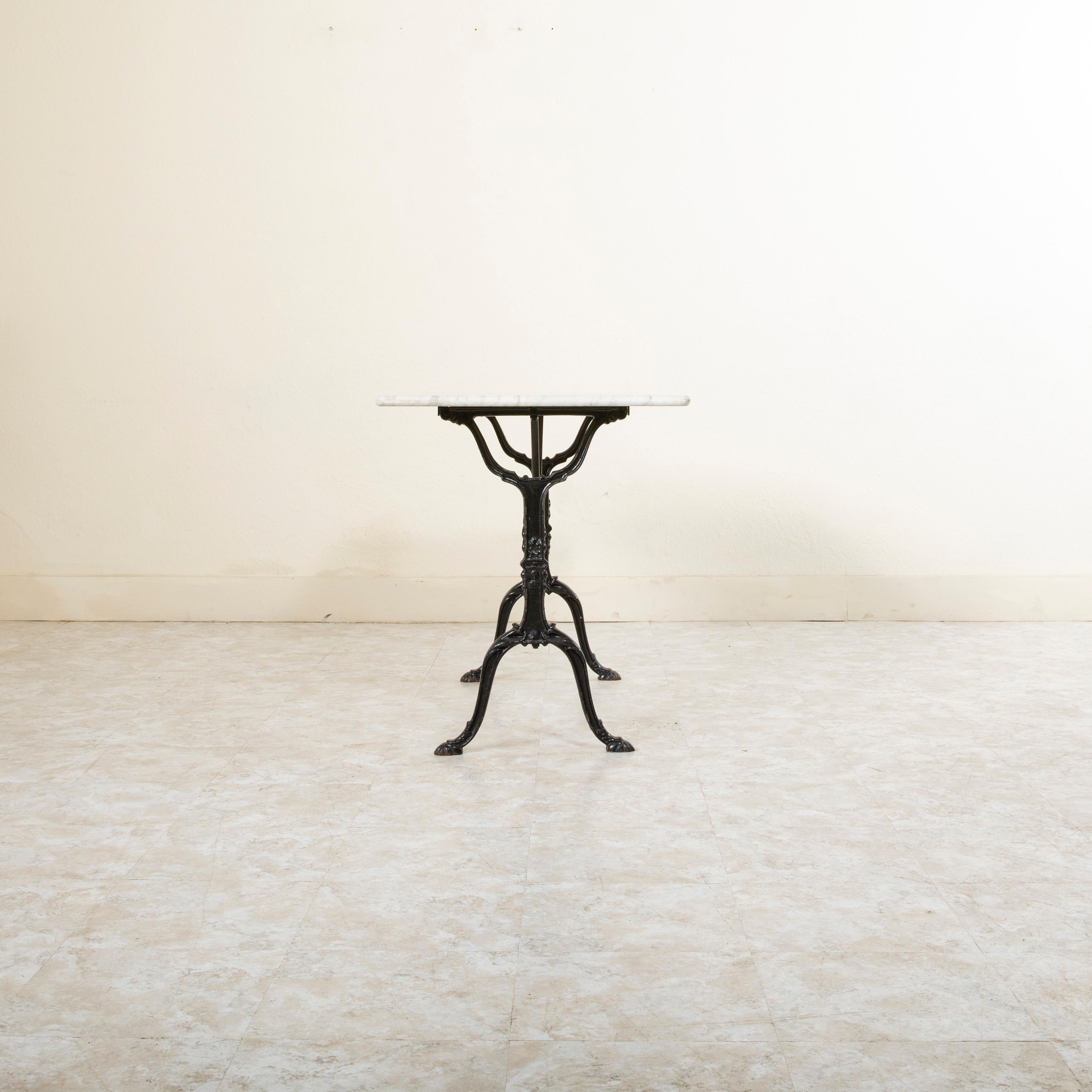 Early 20th Century French Cast Iron Bistro Table with White Marble Top In Good Condition In Fayetteville, AR