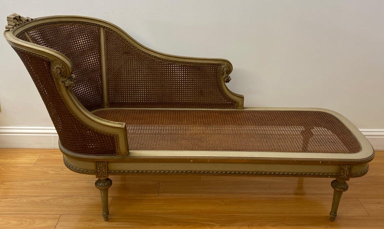 Early 20th century French chaise with restored caning

Outstanding hand carved French walnut chaise lounge with impeccable cane restoration.

The frame has ample remains of the original finish, and shows a few scuff marks throughout

The cane