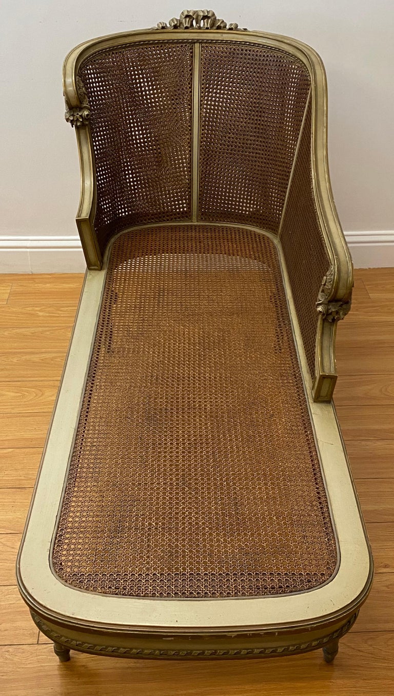 French Provincial Early 20th Century French Chaise with Restored Caning For Sale