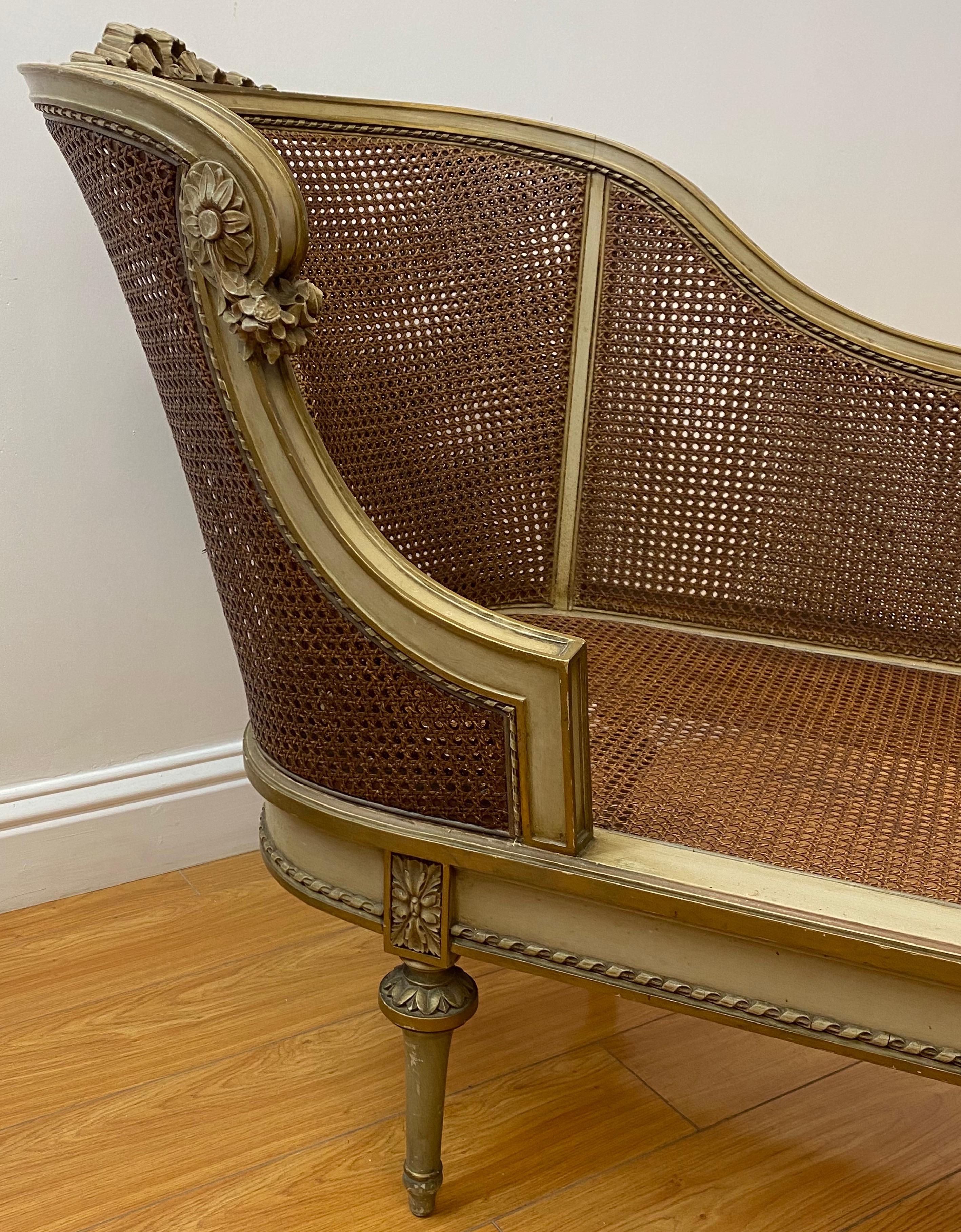 Hand-Carved Early 20th Century French Chaise with Restored Caning