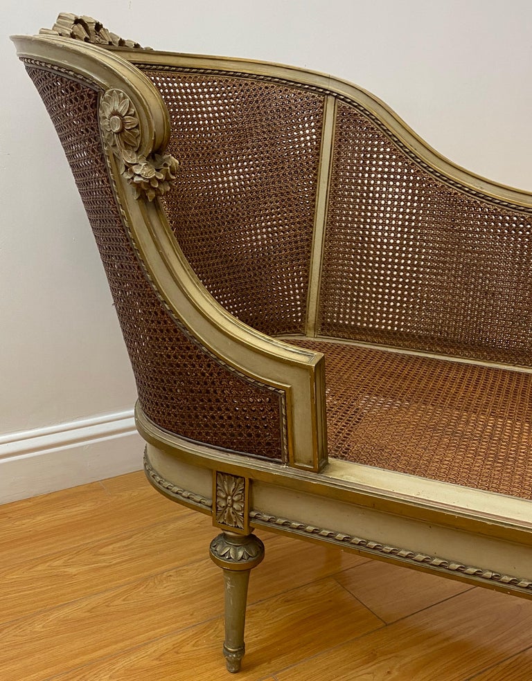 Hand-Carved Early 20th Century French Chaise with Restored Caning For Sale
