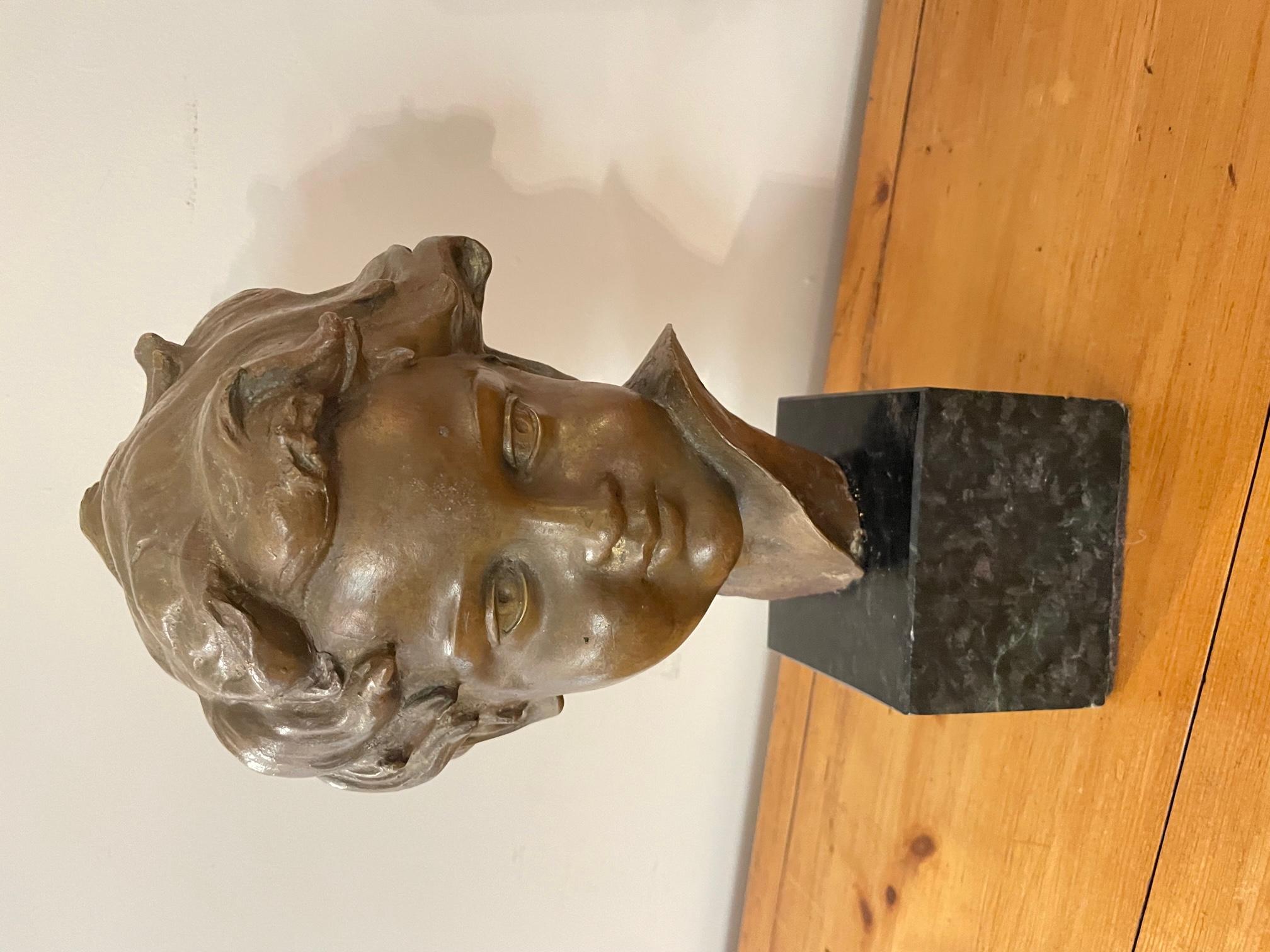 Very nice Early 20th century French Cherub bronze on a black marble base made in the 1900s. 
Good condition and quality.