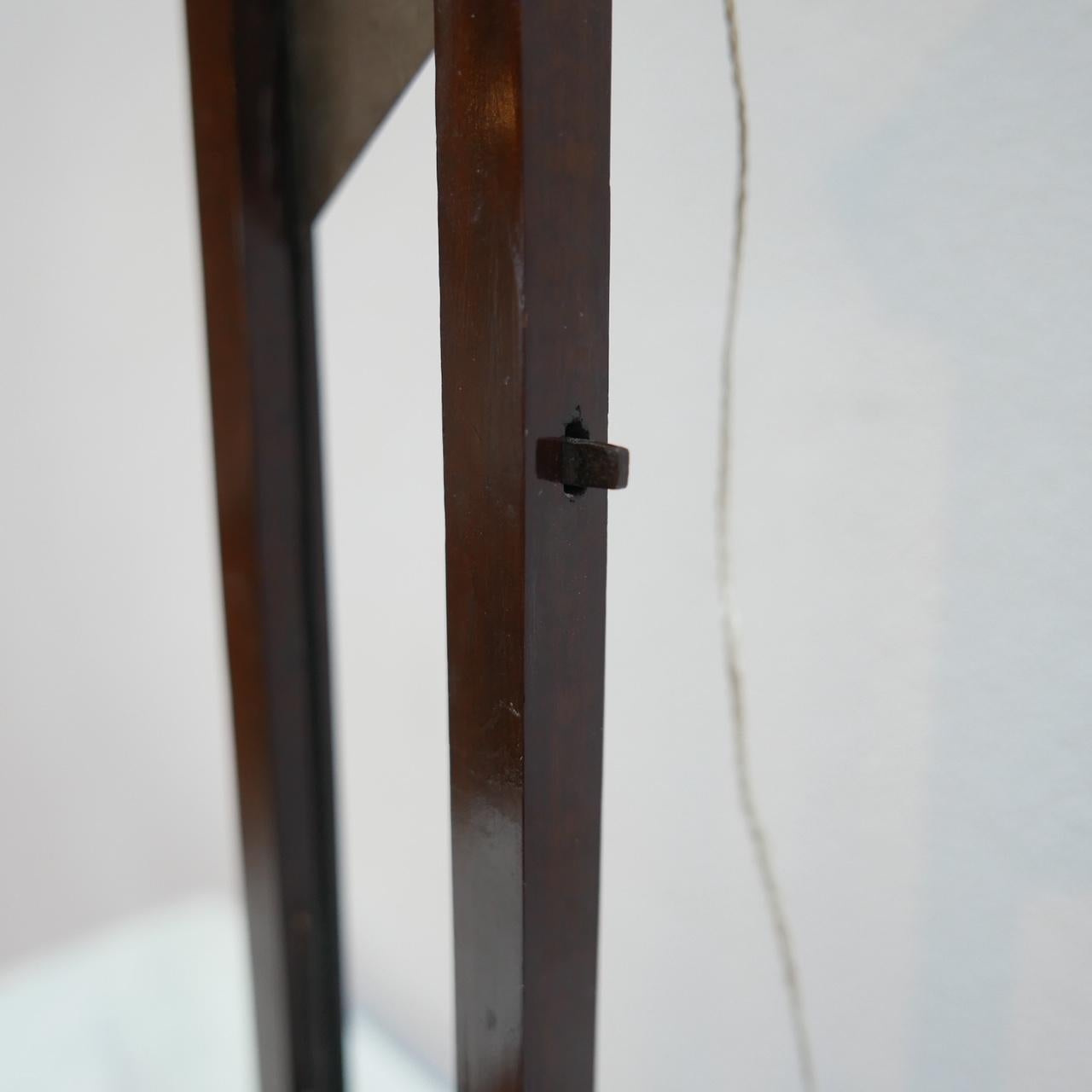 French, early 20th century cigar cutter as a model of a guillotine. 

The guillotine mechanism works and releases well. 

Rare and unusual curio for a desk or a shelf. 

The base looks to be made from rare camphor wood.