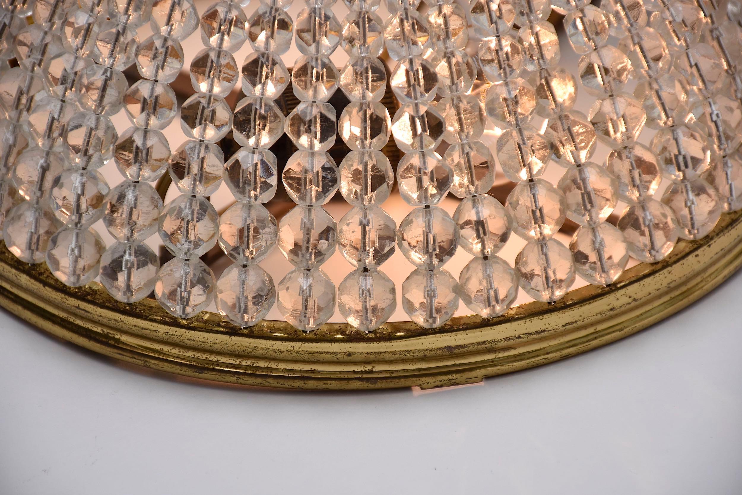 Early 20th century French crystal and gilt brass ceiling fixture Francés en venta