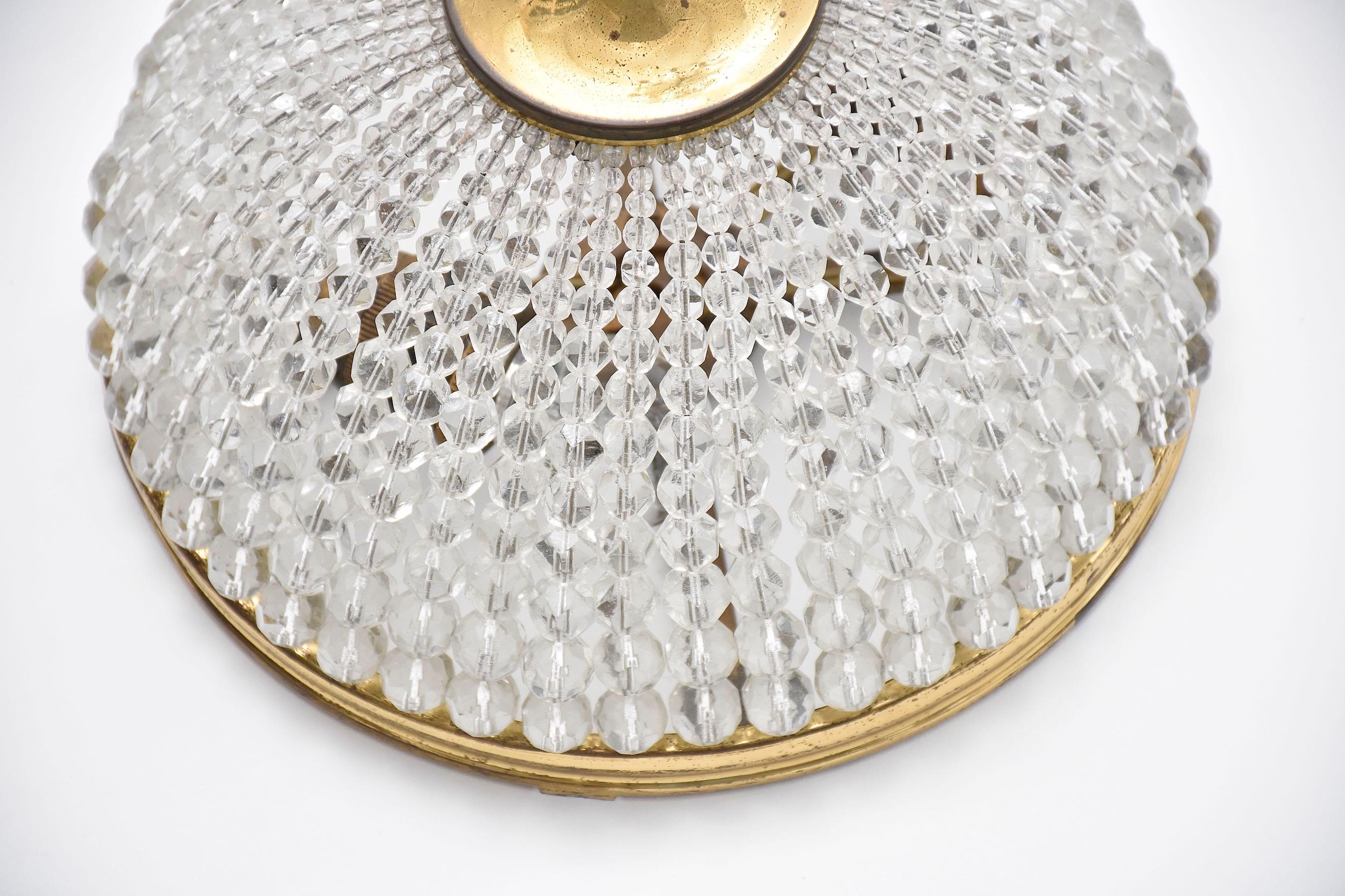 Early 20th century French crystal and gilt brass ceiling fixture siglo XX en venta