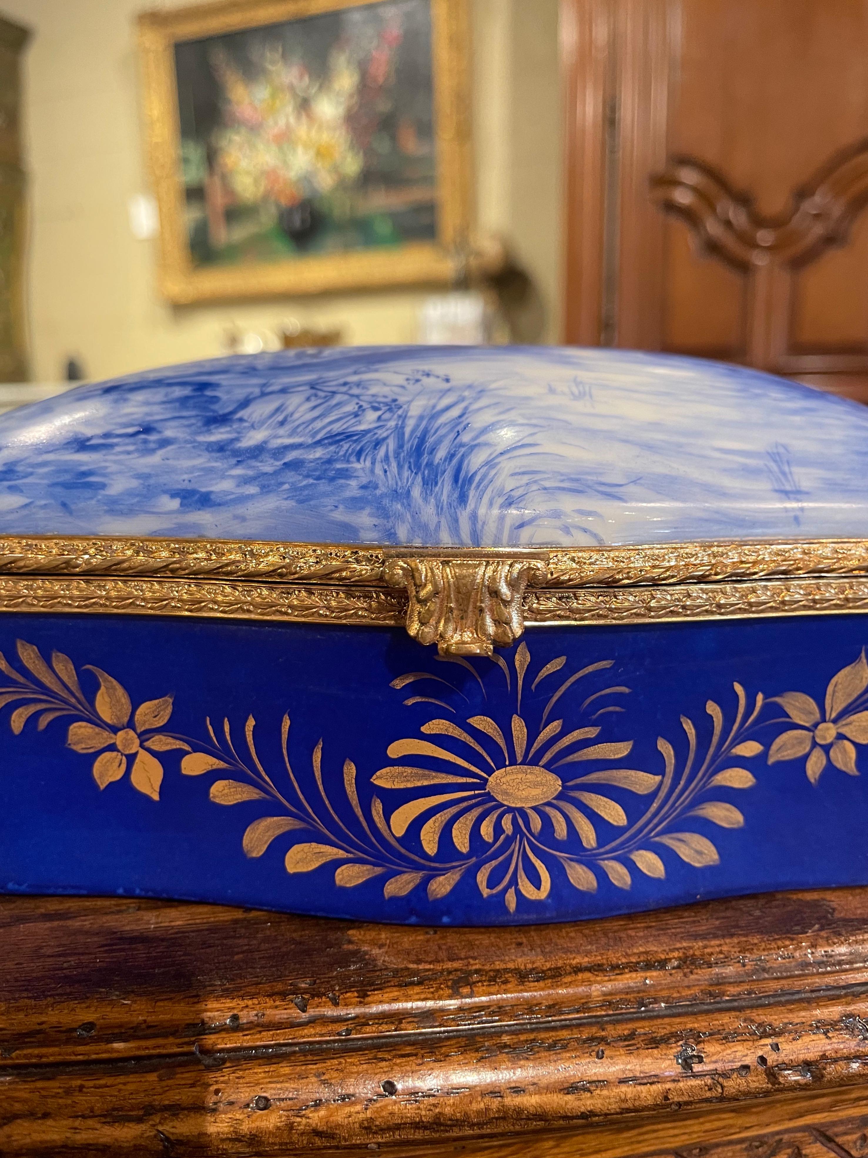 Gilt Early 20th Century French Delft Style Painted Porcelain and Brass Jewelry Box