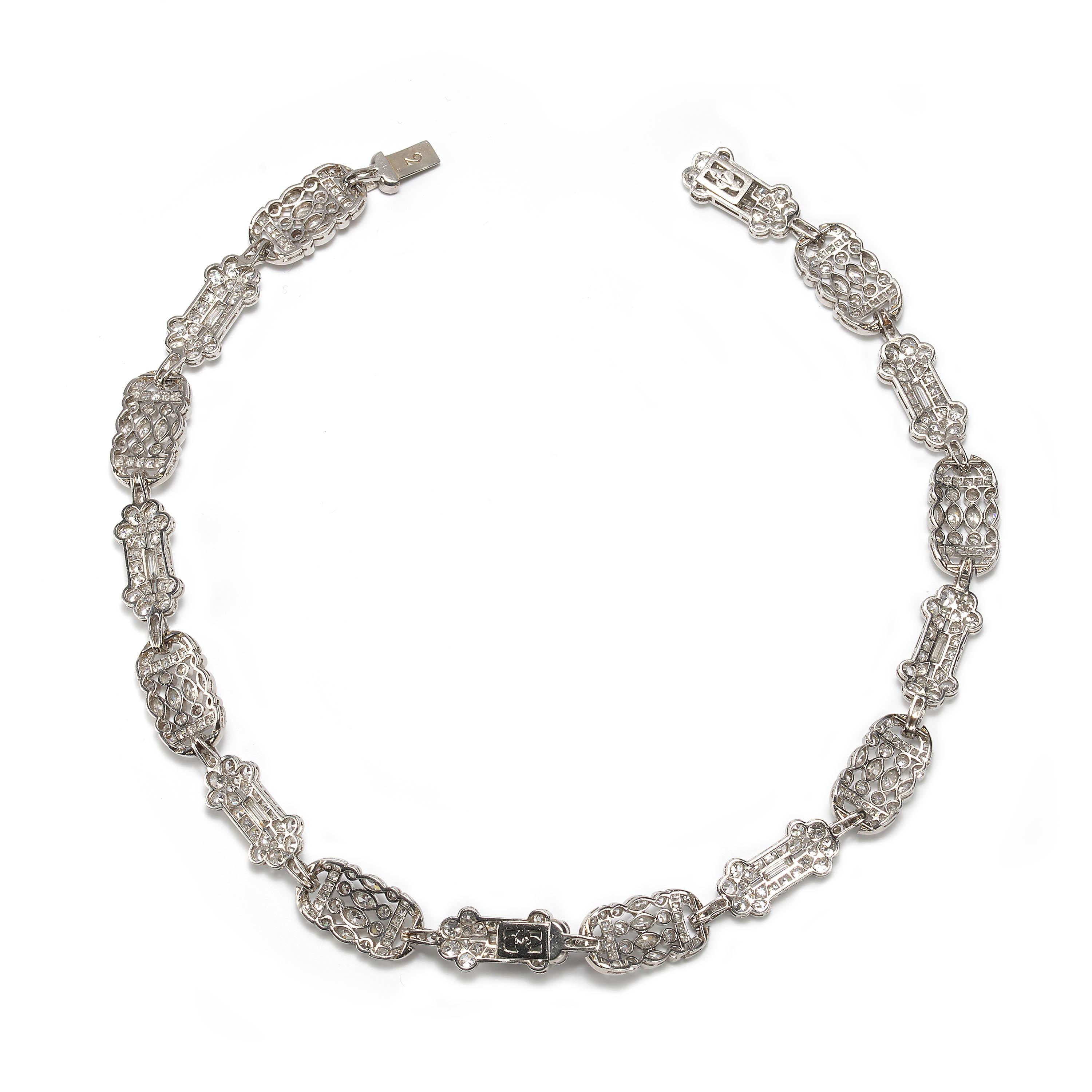 A French Belle Époque diamond necklace bracelets, each bracelet is designed as eight decorative panel sections with alternating designs, set with round, single, baguette and marquise-cut diamonds, weighing an estimated total of 20.00ct, mounted in