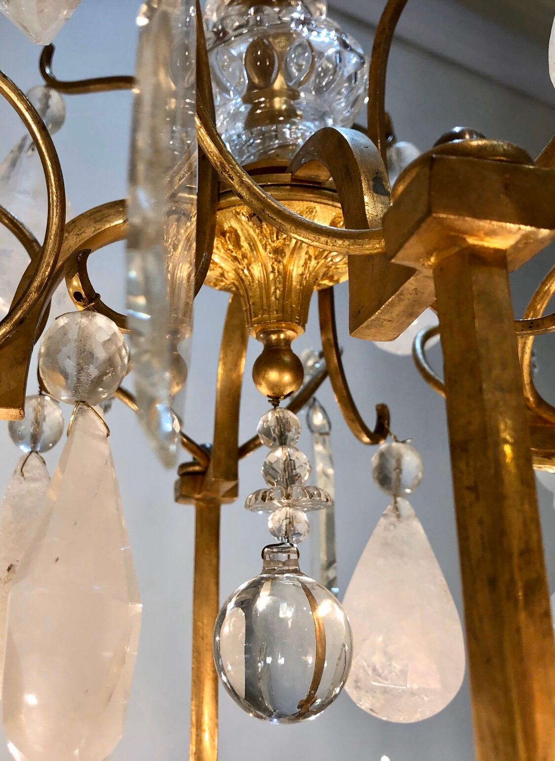 Early 20th Century French Eight Arm Rock Crystal and Gilt Bronze Chandelier In Good Condition For Sale In Charleston, SC
