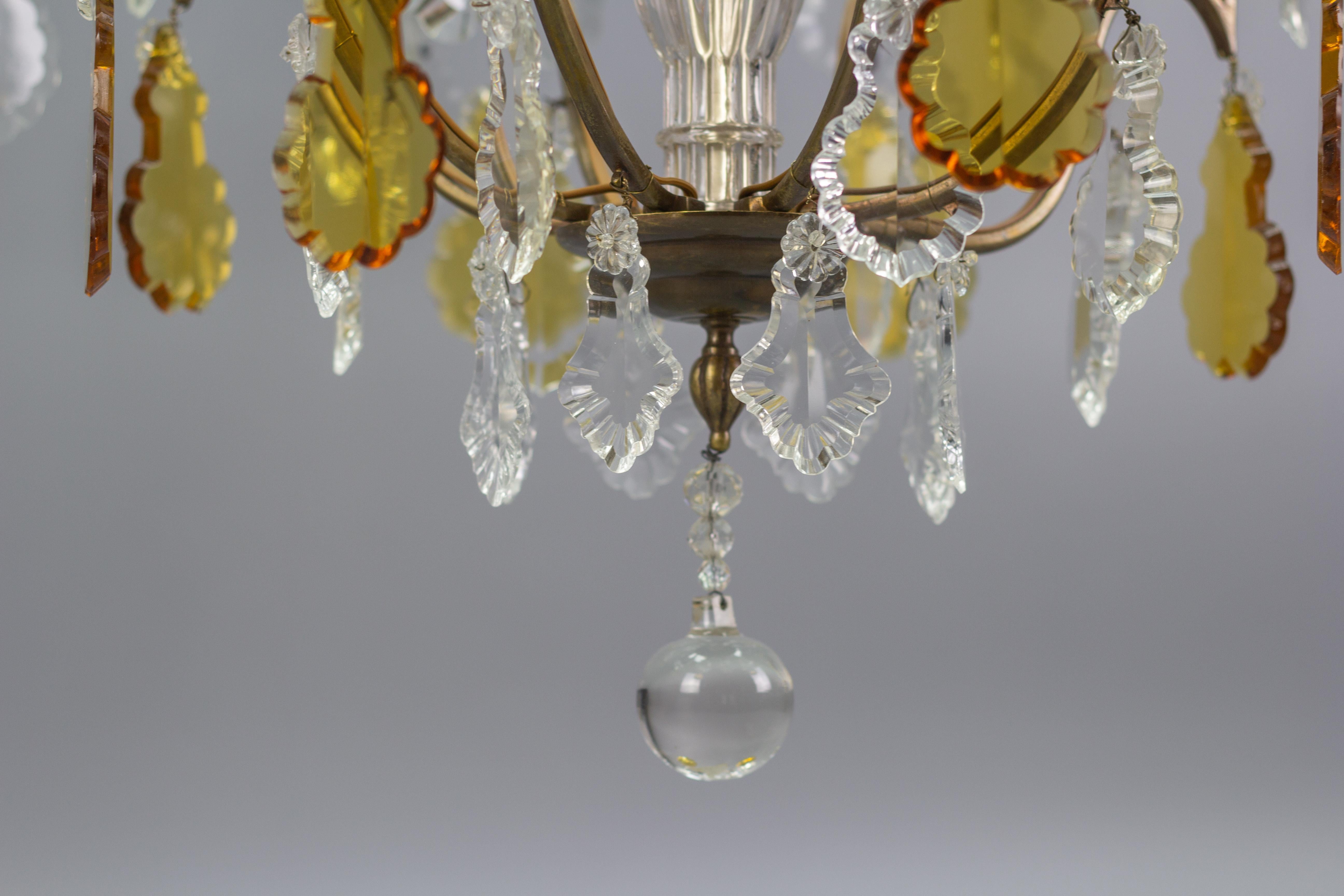 Early 20th Century French Eight–Light Crystal Glass and Brass Chandelier For Sale 4