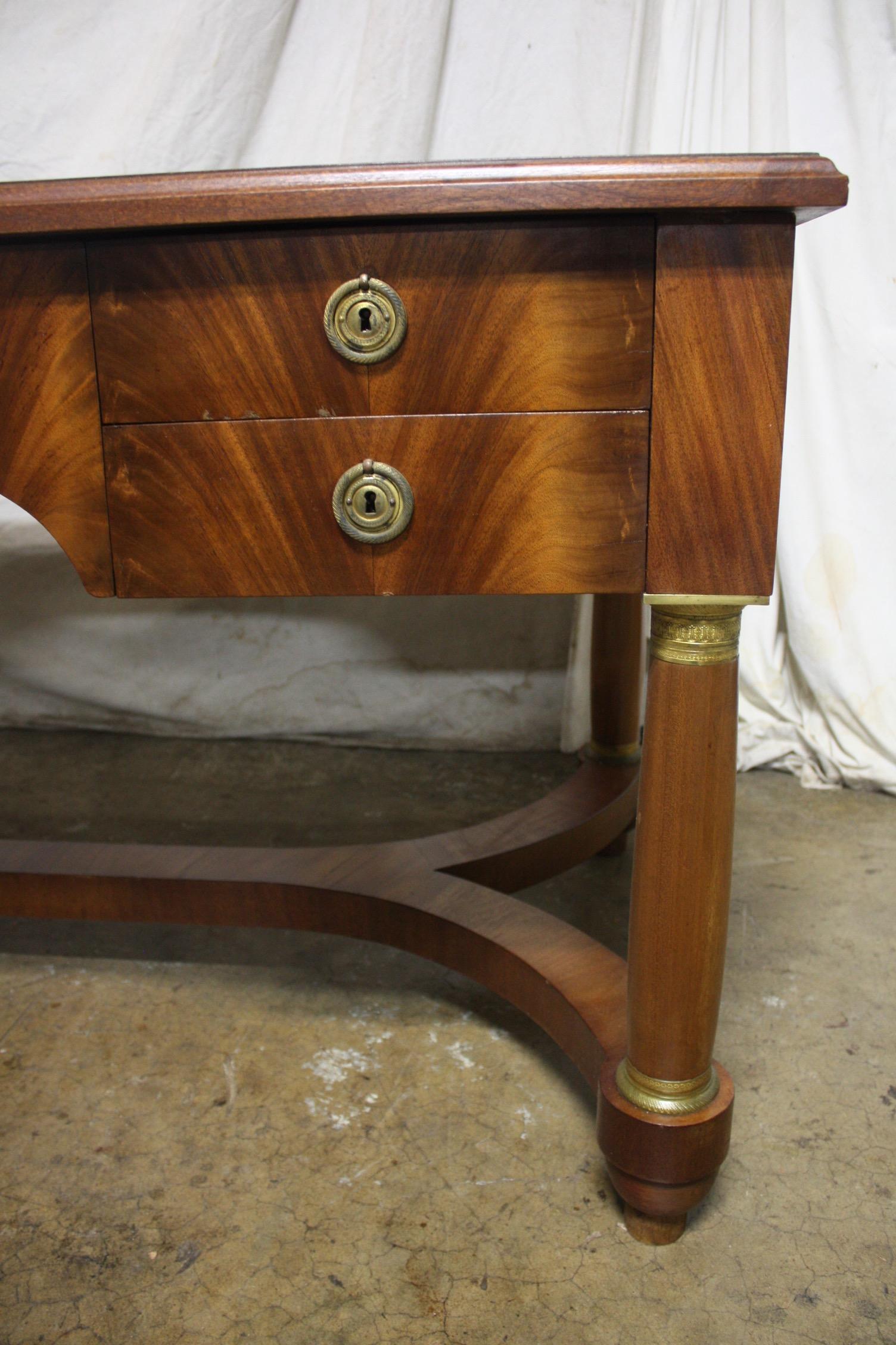 Early 20th century French Empire desk, with 2 extensions on each side. Each extension is 13in.W.
    