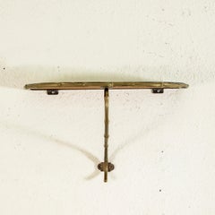 Etagère murale en faux bambou, laiton et verre miroité, début du 20e siècle, France