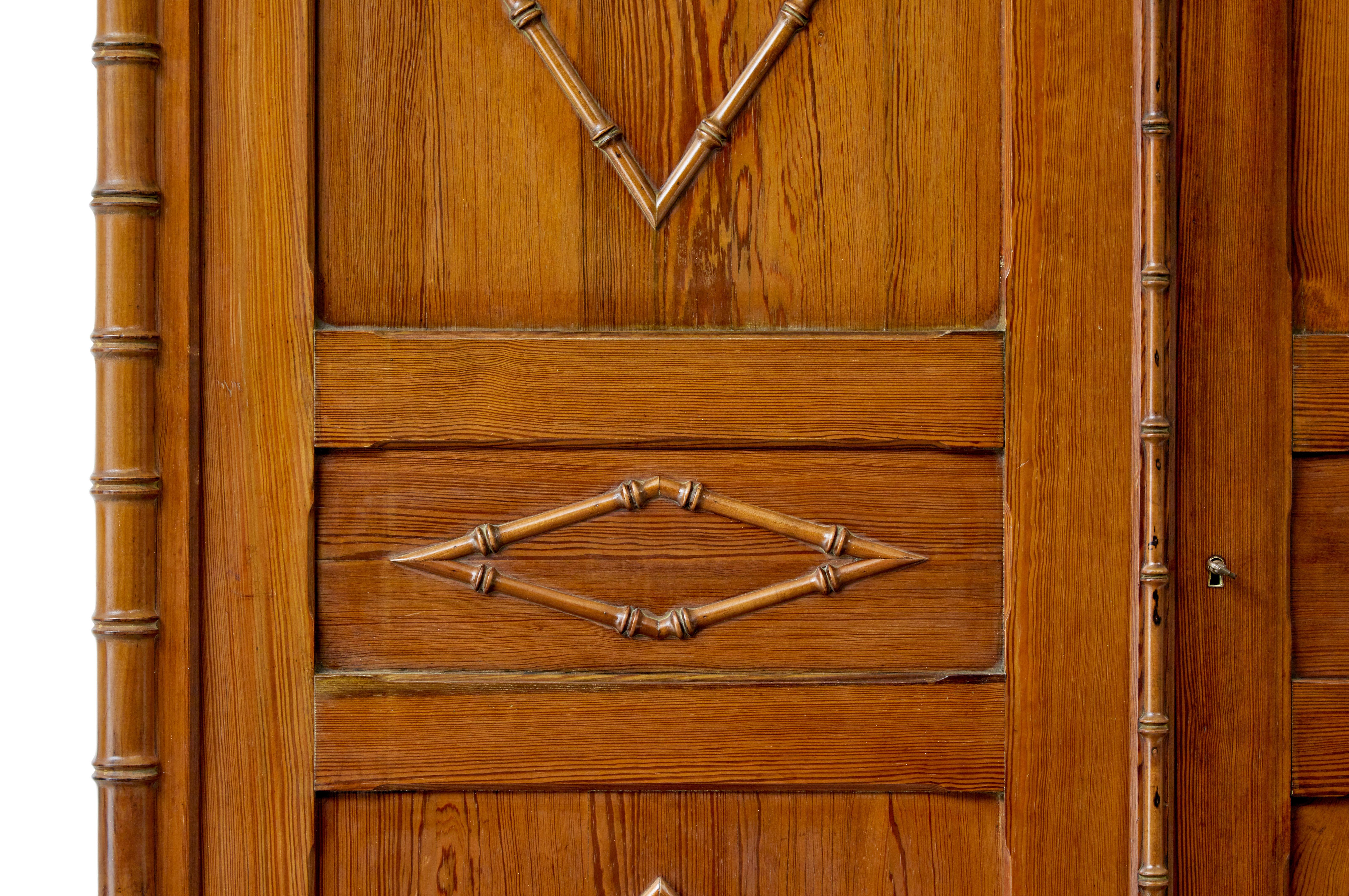 20th Century Early 20th century French faux bamboo pine wardrobe