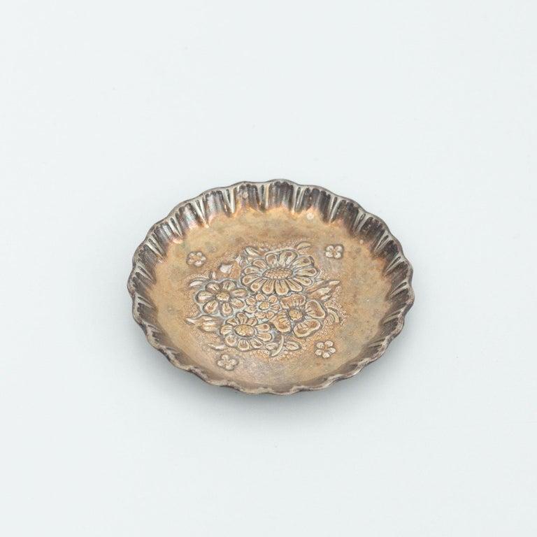Metal ashtray by unknown manufactured from France, circa early 20th century.

In original condition, with minor wear consistent with age and use, preserving a beautiful patina.

Material:
Metal

Dimensions:
Ø 7.1 cm x H 0.7 cm.
