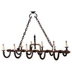 Early 20th Century French Forged Iron Ten-Light Chandelier