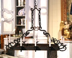 Early 20th Century French Gothic Flat Bottom Iron Ten-Light Chandelier