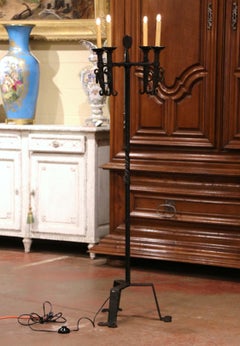 Vierflammige Stehlampe aus geschmiedetem Eisen, Anfang 20.