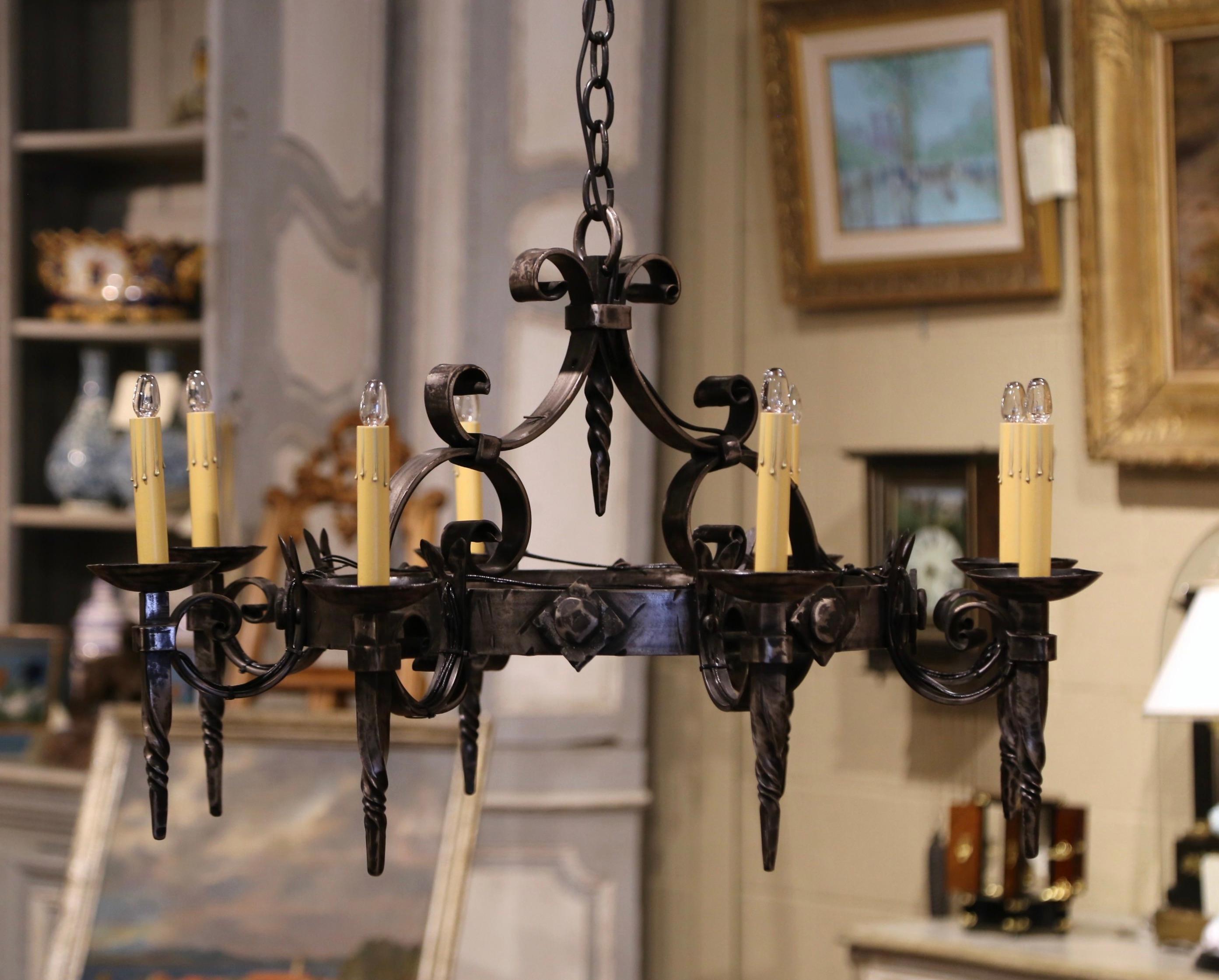 Early 20th Century French Gothic Polished Wrought Iron Eight-Light Chandelier In Excellent Condition In Dallas, TX