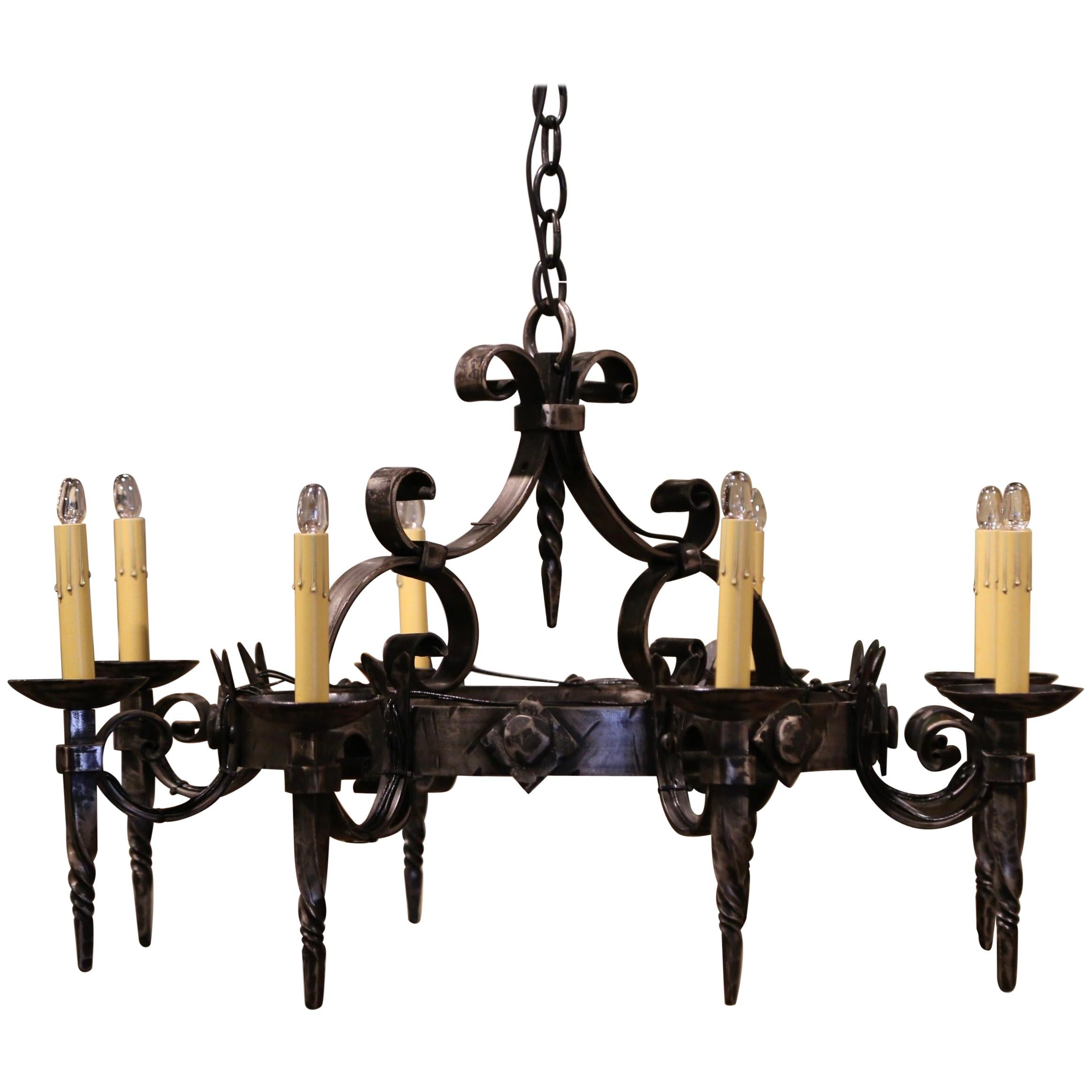 Early 20th Century French Gothic Polished Wrought Iron Eight-Light Chandelier
