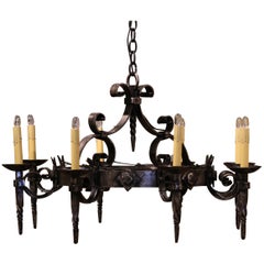 Early 20th Century French Gothic Polished Wrought Iron Eight-Light Chandelier