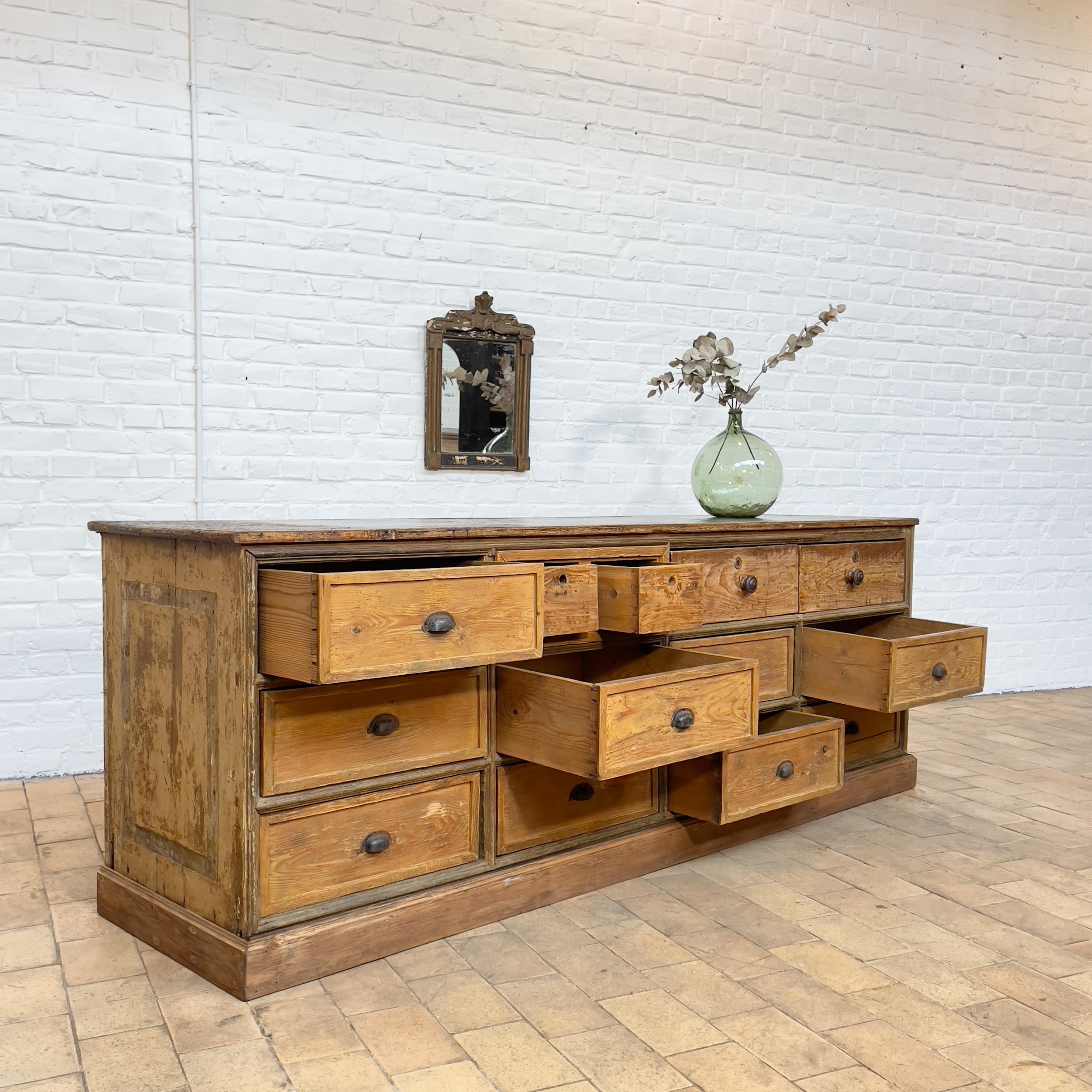 Early 20th century French haberdashery cabinet with drawers
Original patina preserved.
13 drawers including 2 small ones.
Oak and fir.
Good condition.