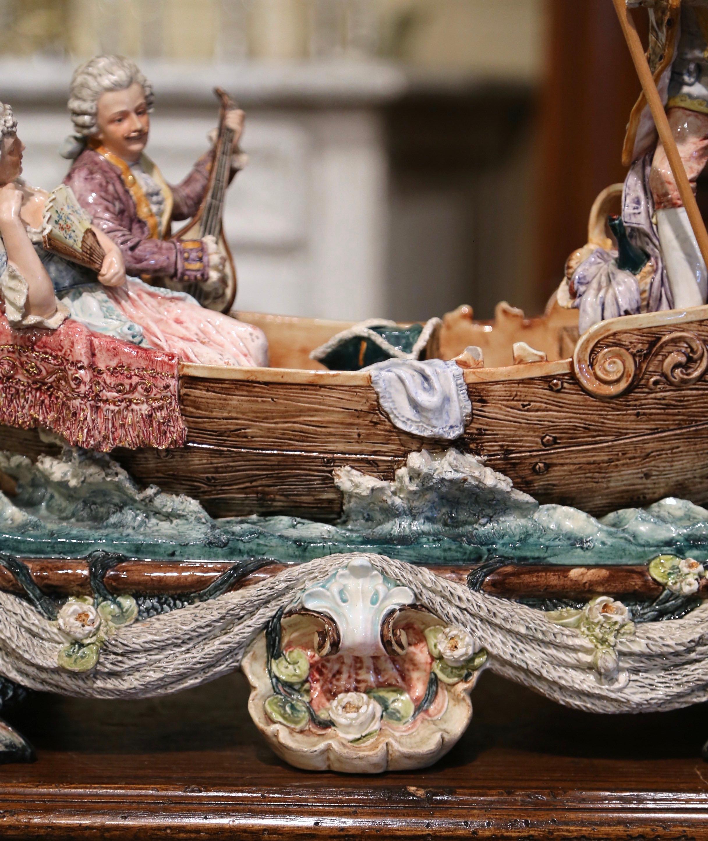 Hand-Crafted Early 20th Century French Hand-Painted Barbotine Boat and People Composition For Sale