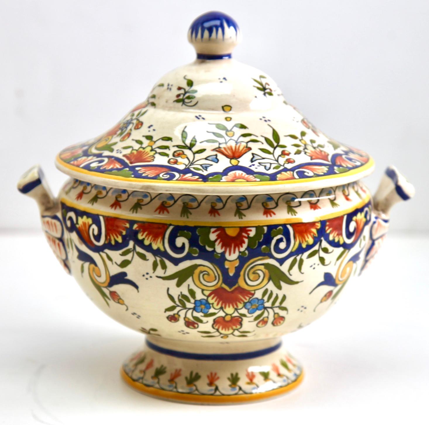 The designs on this French faience group is typical of pottery made in Rouen. 
Early 20th century French hand-painted Faience Terrine from Rouen.
Marking on the bottom: 