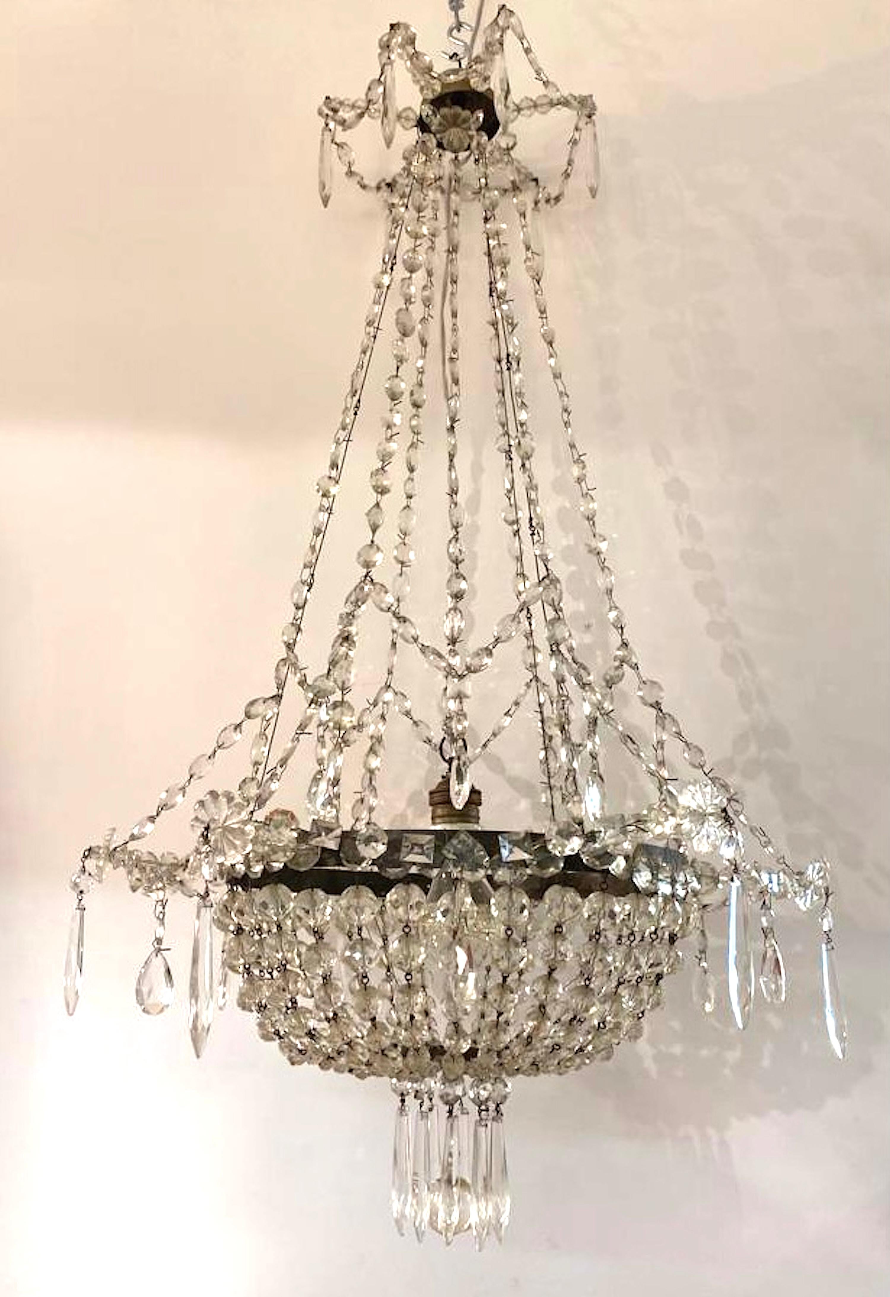 Early 20th Century French Iron and Crystal Chandelier. For Sale 6