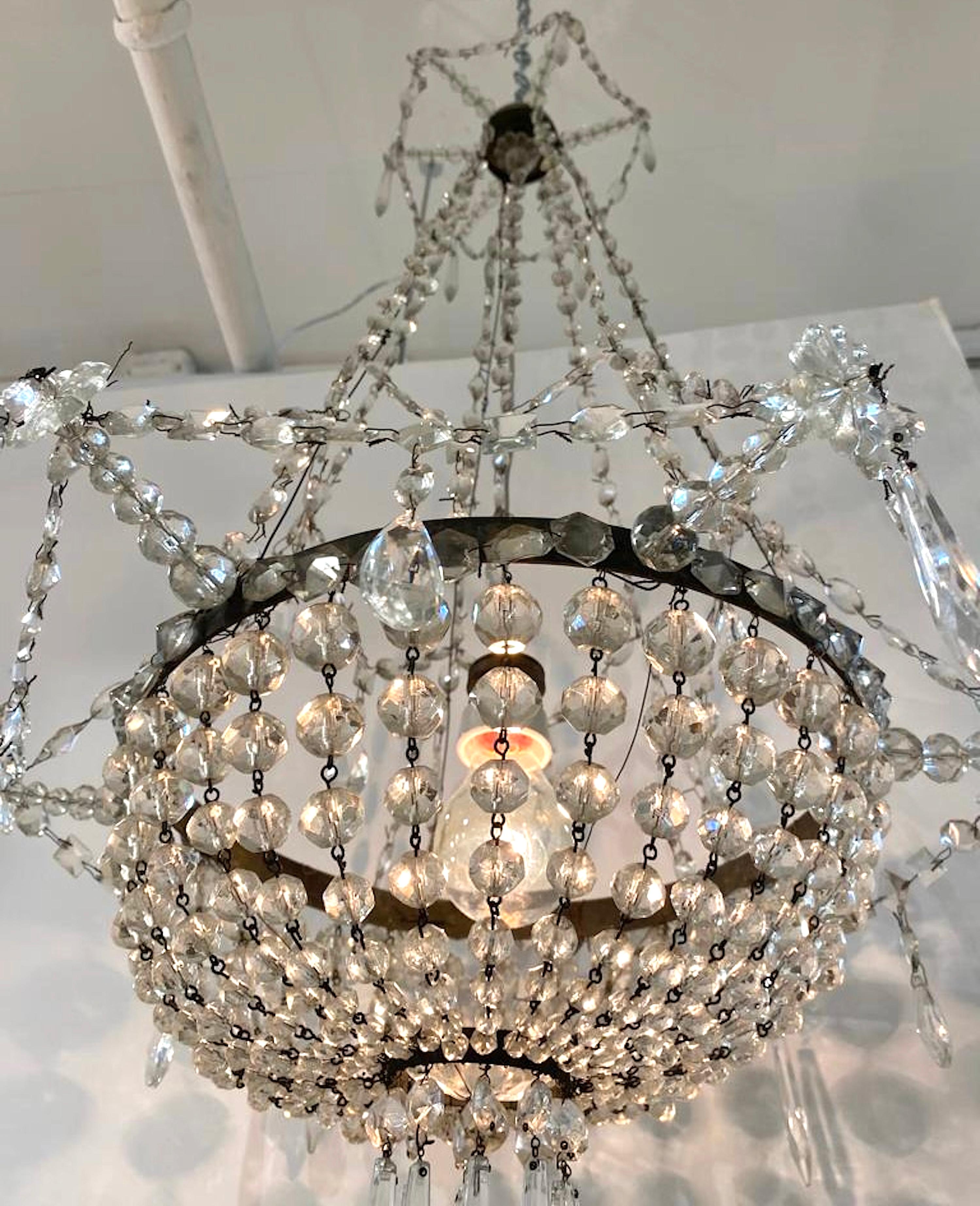 Early 20th Century French Iron and Crystal Chandelier. For Sale 9
