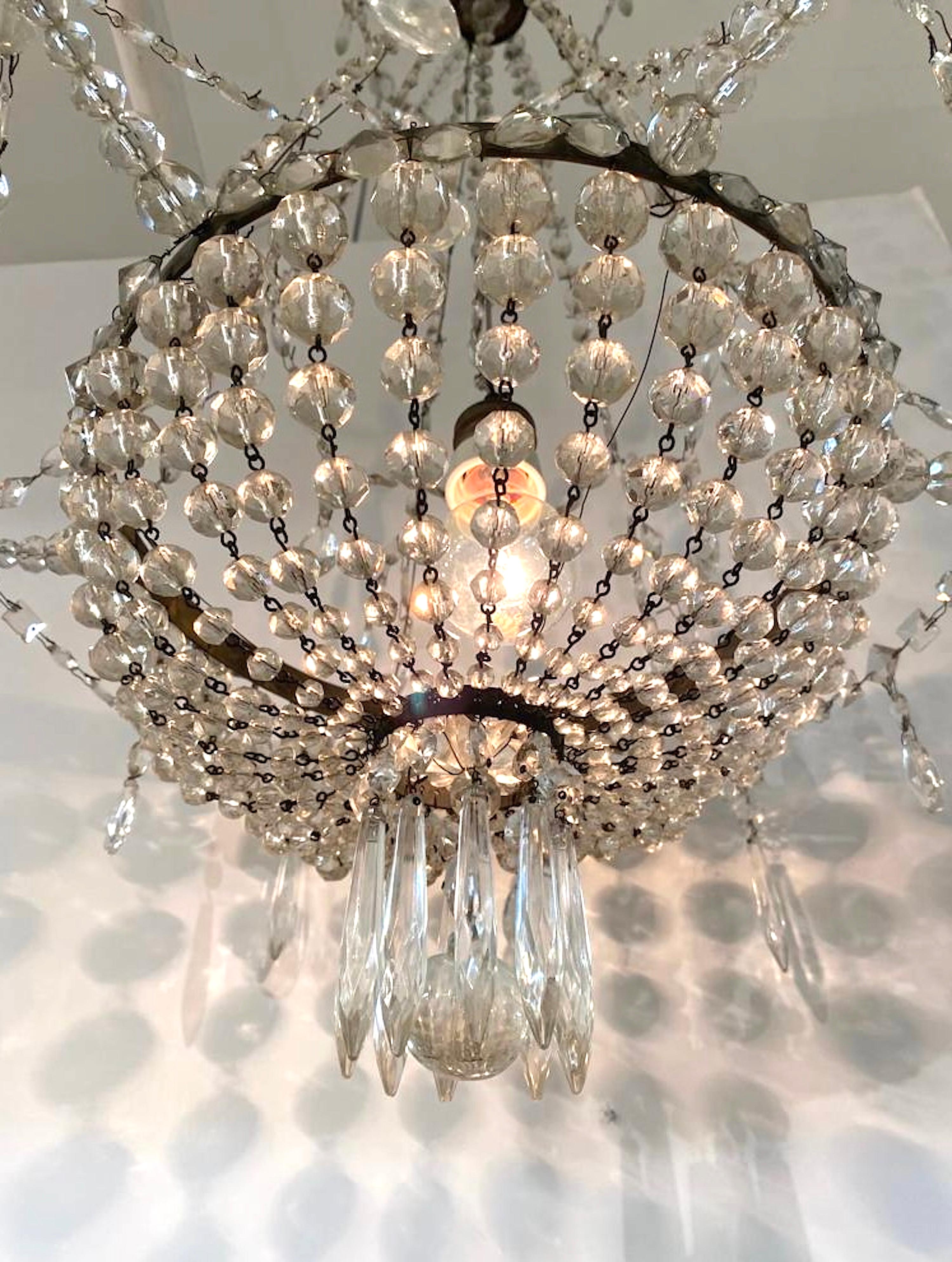 Early 20th Century French Iron and Crystal Chandelier. For Sale 10