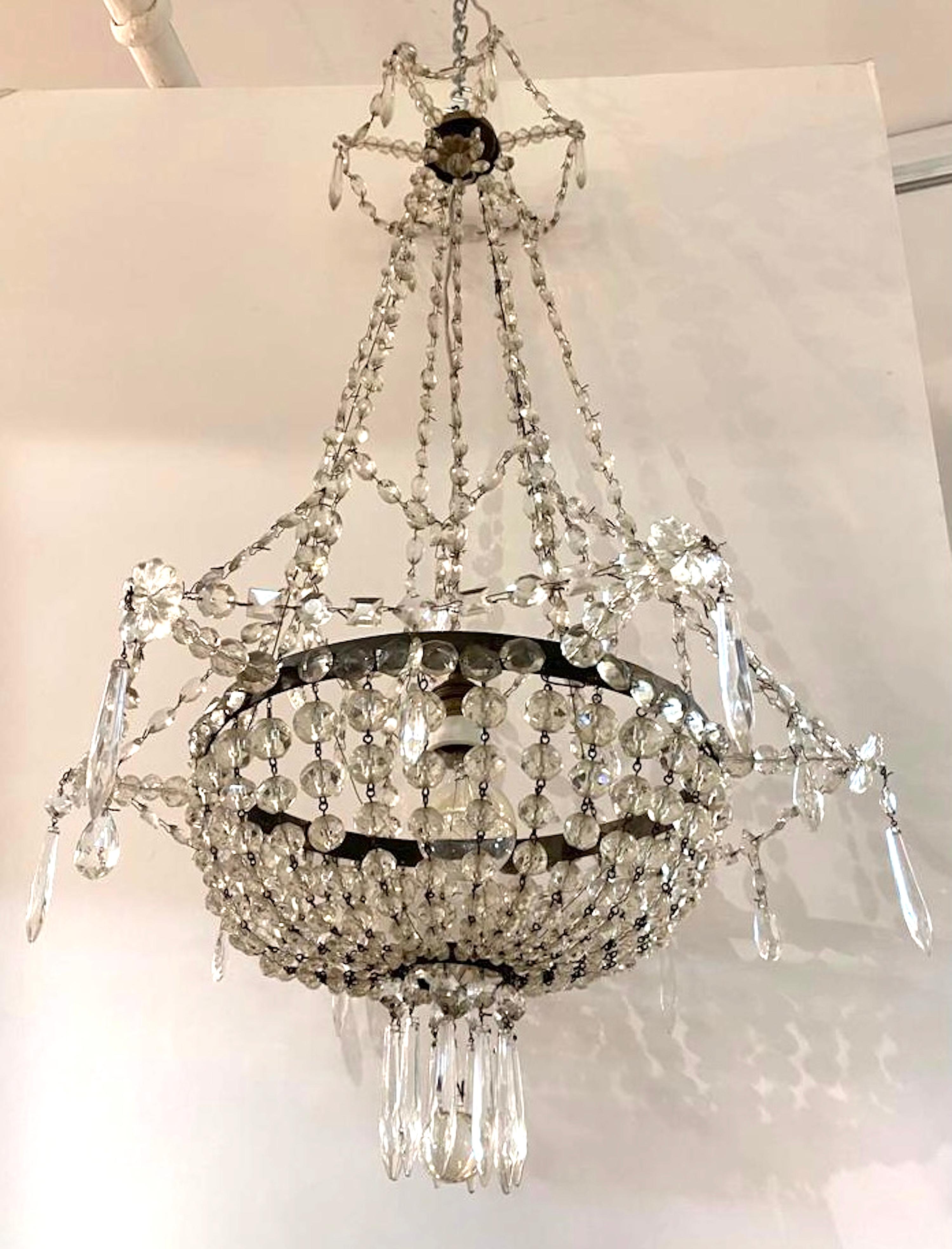 Early 20th Century French Iron and Crystal Chandelier. For Sale 3