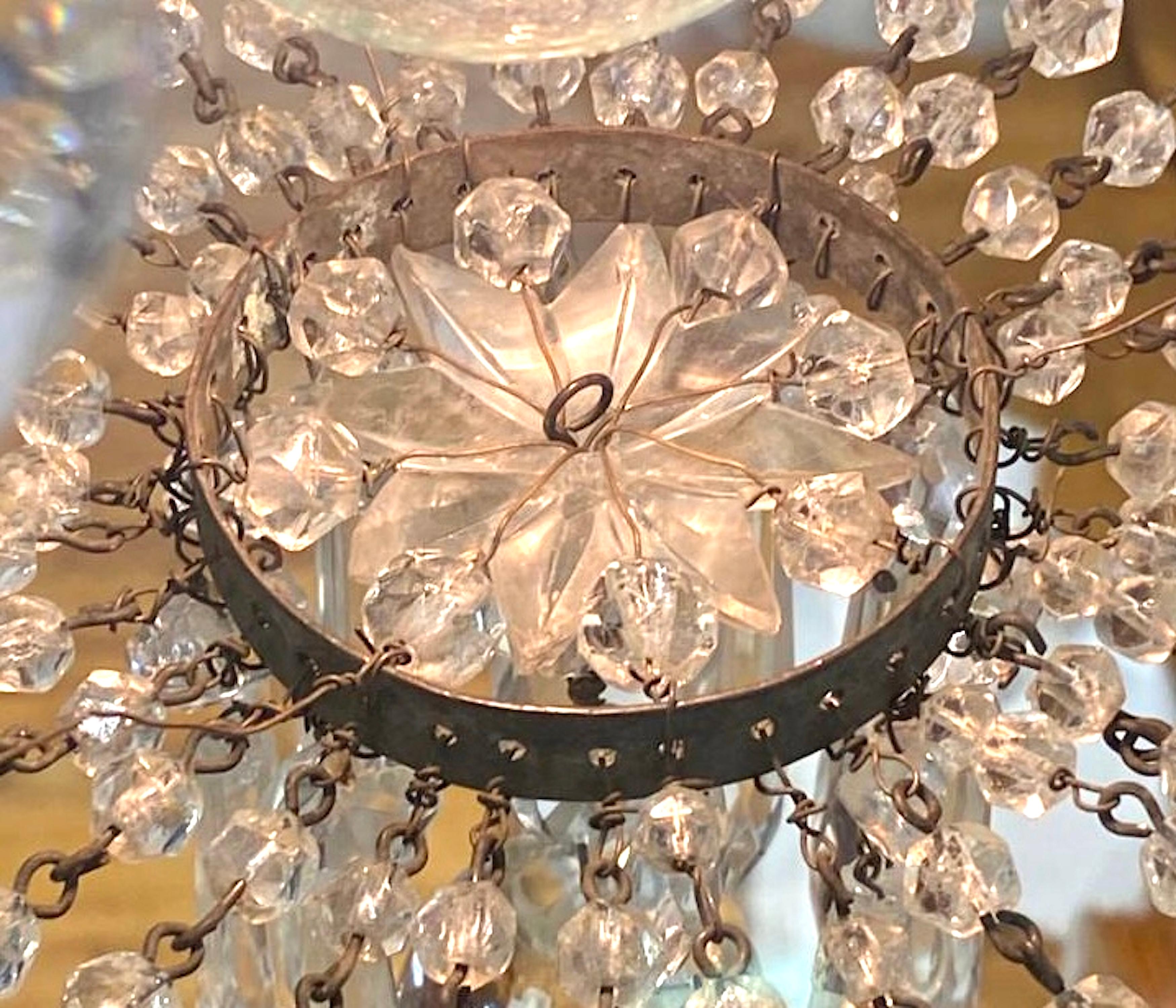 Early 20th Century French Iron and Crystal Chandelier. For Sale 4