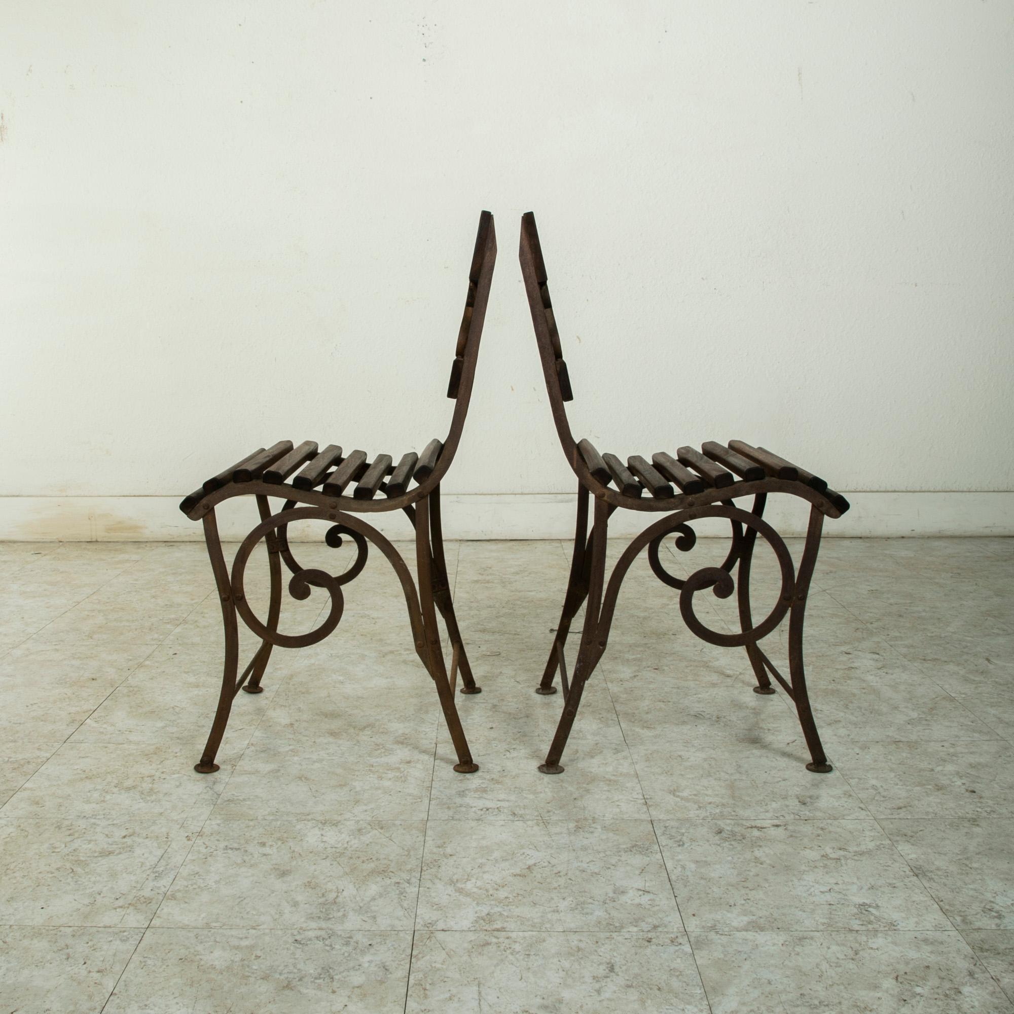 Early 20th Century French Iron and Wooden Bistro Set, Table and Two Chairs 1