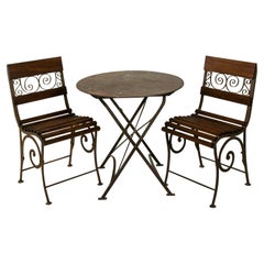 Antique Early 20th Century French Iron and Wooden Bistro Set, Table and Two Chairs