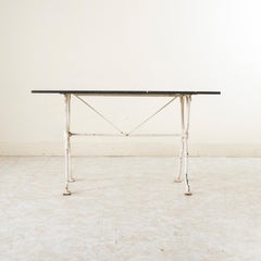 Early 20th Century French Iron Bistro Table with Black Marble Top, 53-in Long