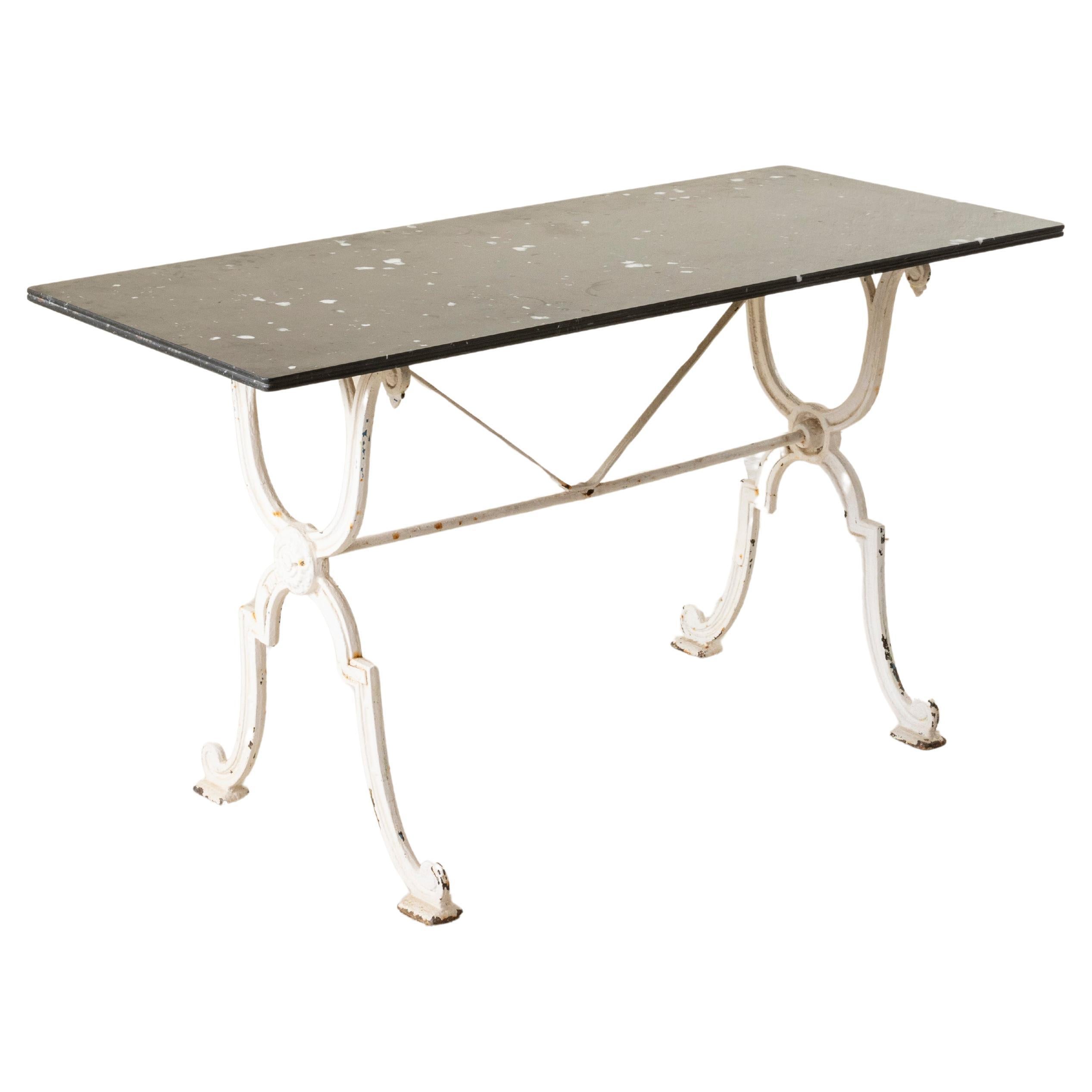 Early 20th Century French Iron Bistro Table with Black Marble Top, 53-in Long For Sale